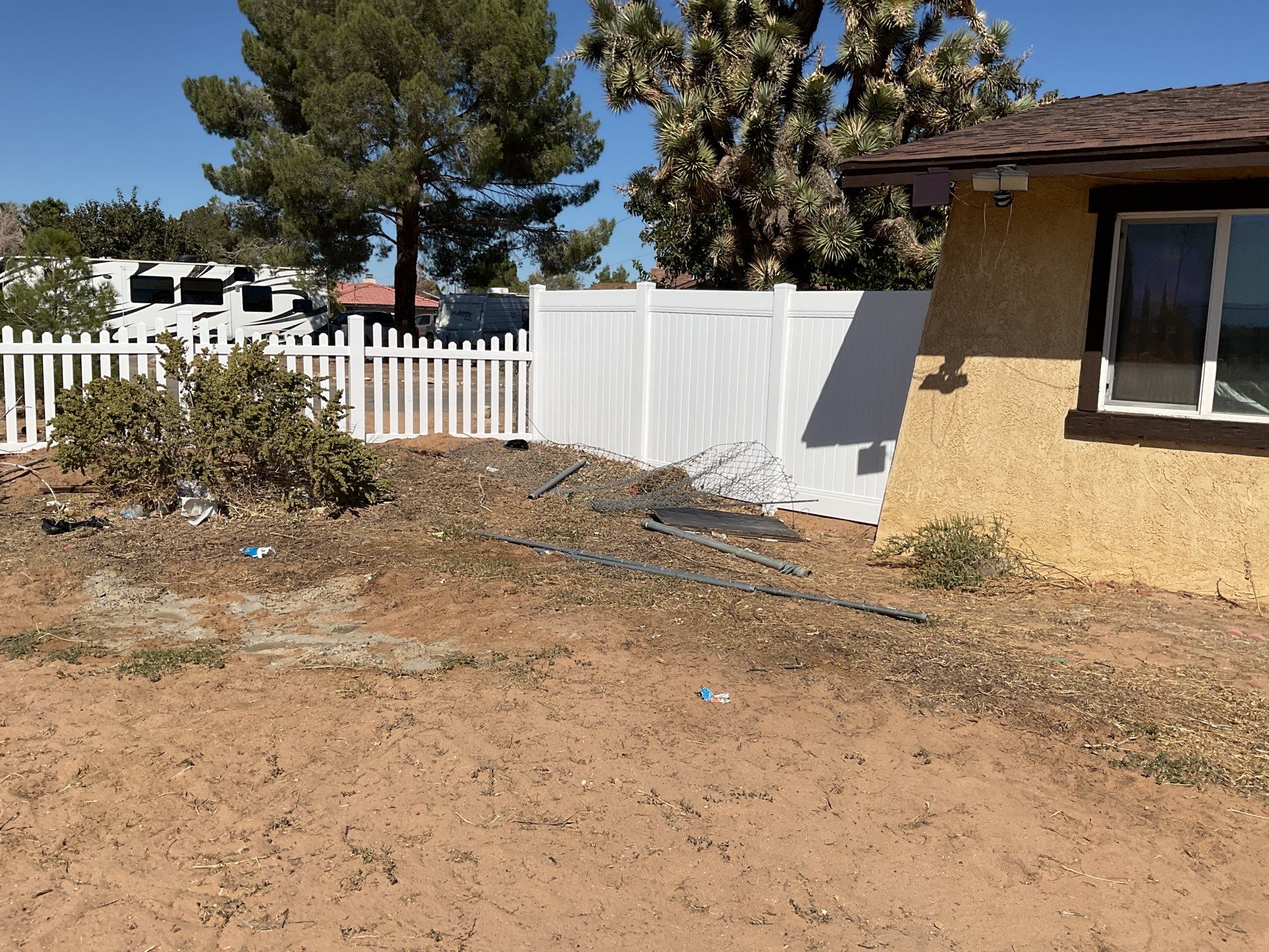 White picket fence  by Fence Guys Inc. 