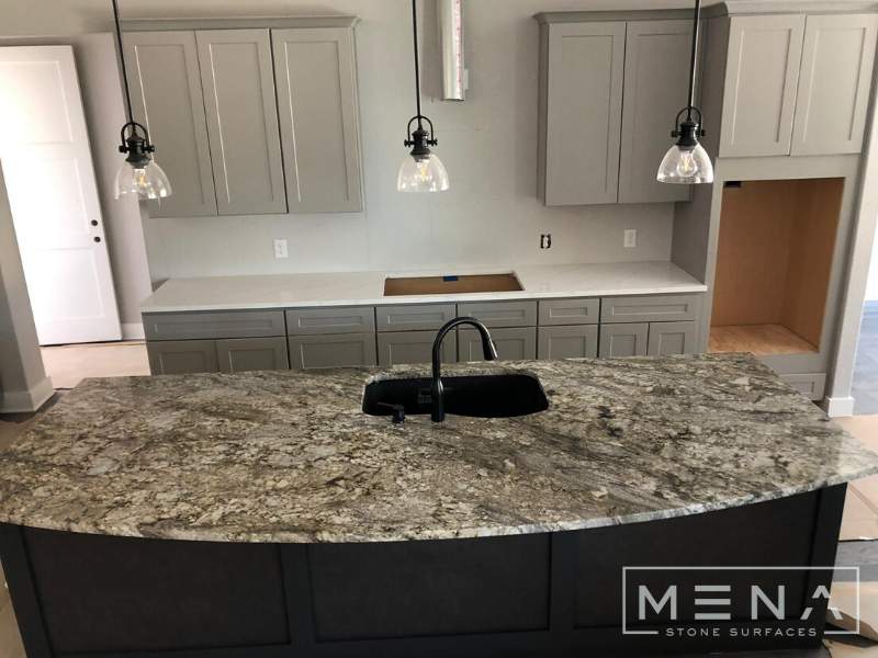 Kitchen countertops using Blue Dunes Granite by Mena stone surfaces