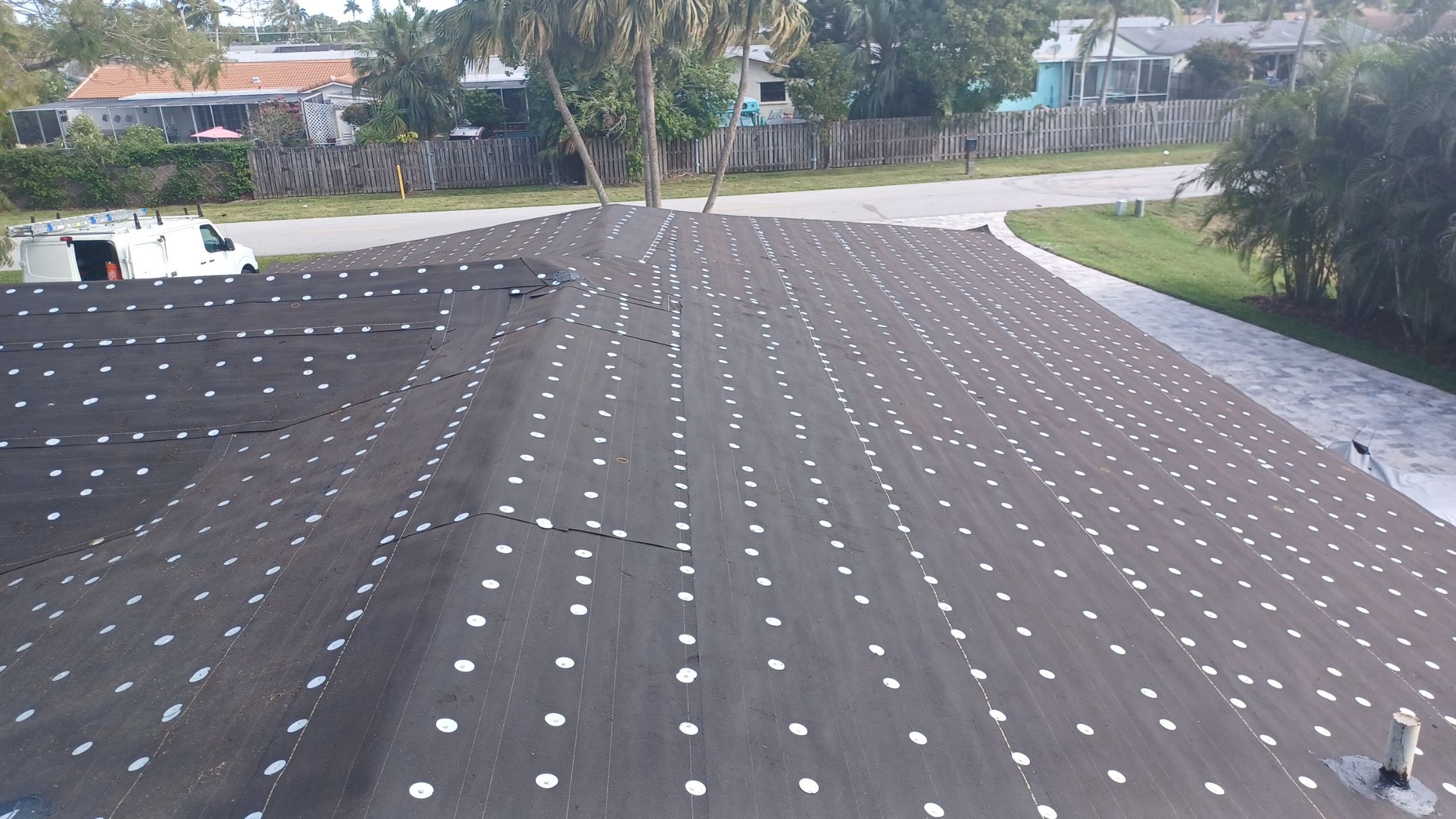Residential Roofing Installation using 1" Nail strip metal roof by BLUES BROTHERS ROOFING