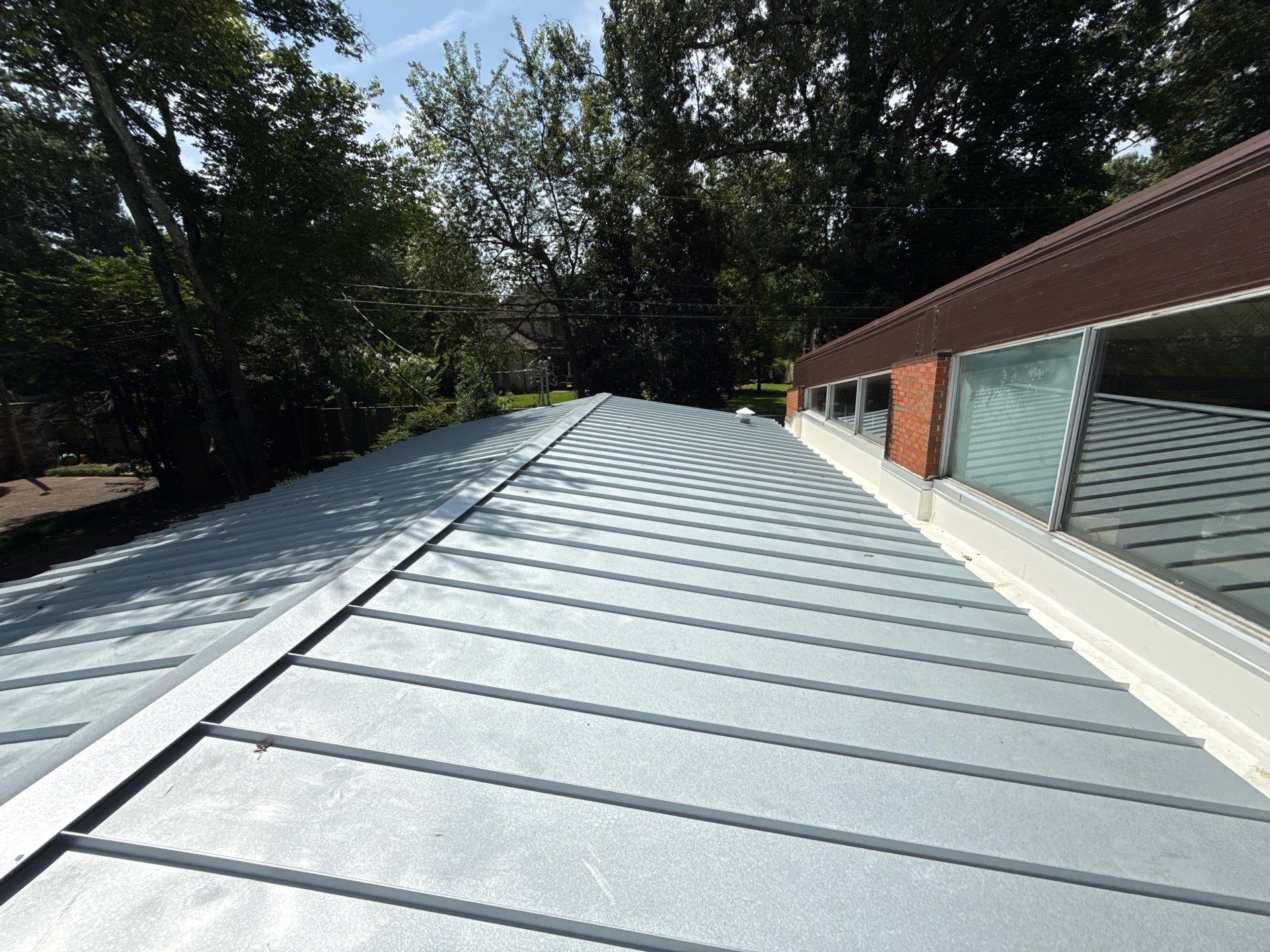 Residential Standing Seam Metal Roof and Membrane Replacement in Memphis by Revival Roofing Services
