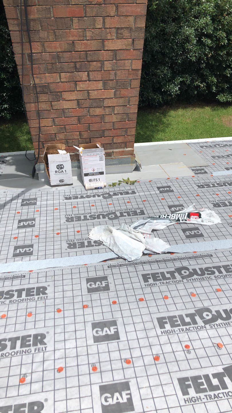 Residential Roofing Installation using Roof Replacement by American Roofing & Construction LLC
