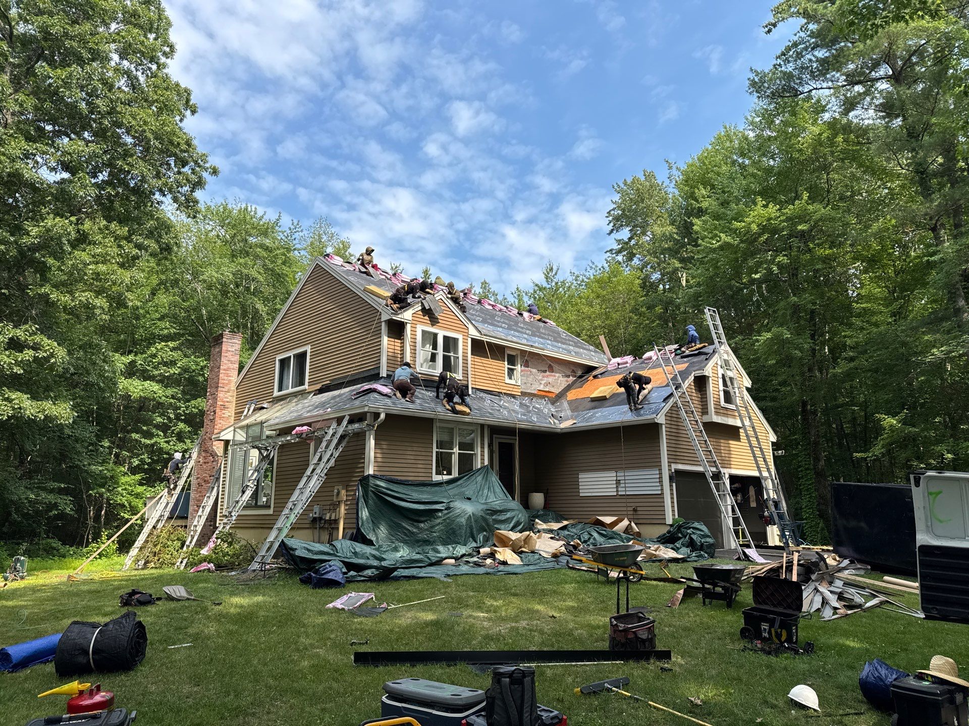 Complete Exterior Remodel in Stratham, NH Near Turnberry Road with Roofing, Siding, Windows, Gutters, and PVC Trim by Compass exteriors