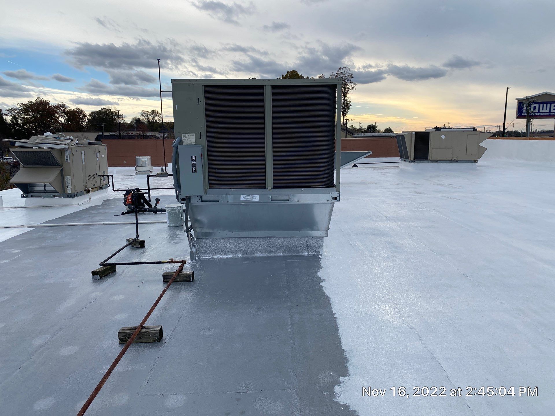 Commercial Coating using Poly Urerthane and Silicone Coating by Just In Time Roofing and Restoration