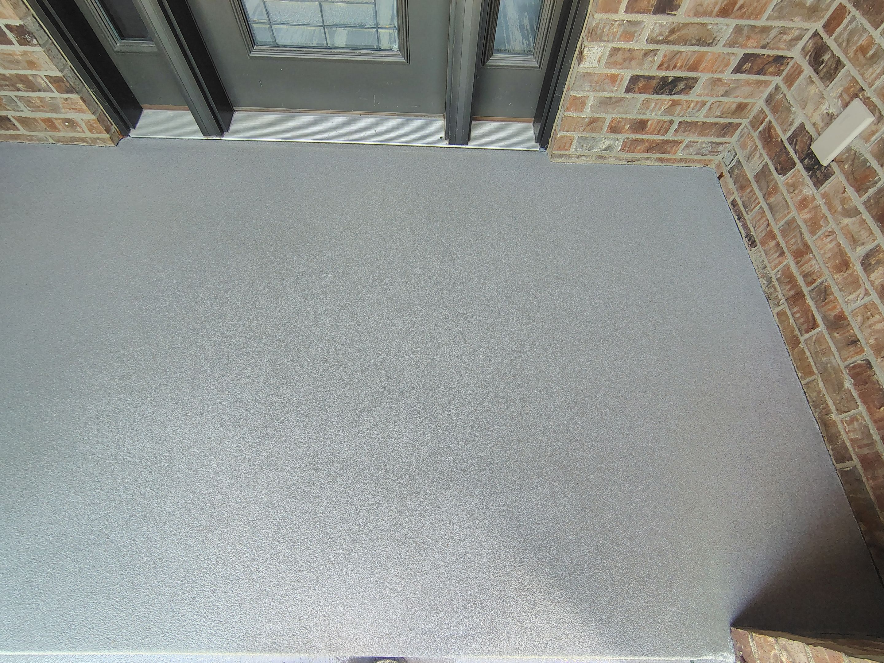 Front Porch Concrete Coating and Restoration in Harrisburg by Select Painting, Coatings & Garage Cabinets