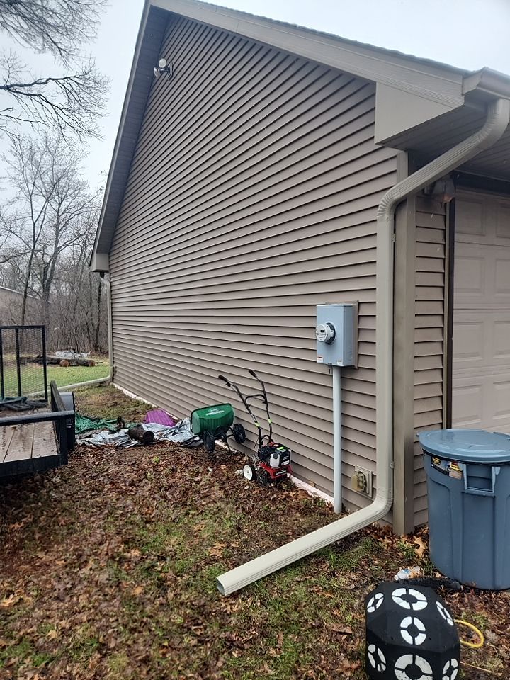 Downspout only in Big Lake by Next Level Seamless Gutters / Exteriors Inc.