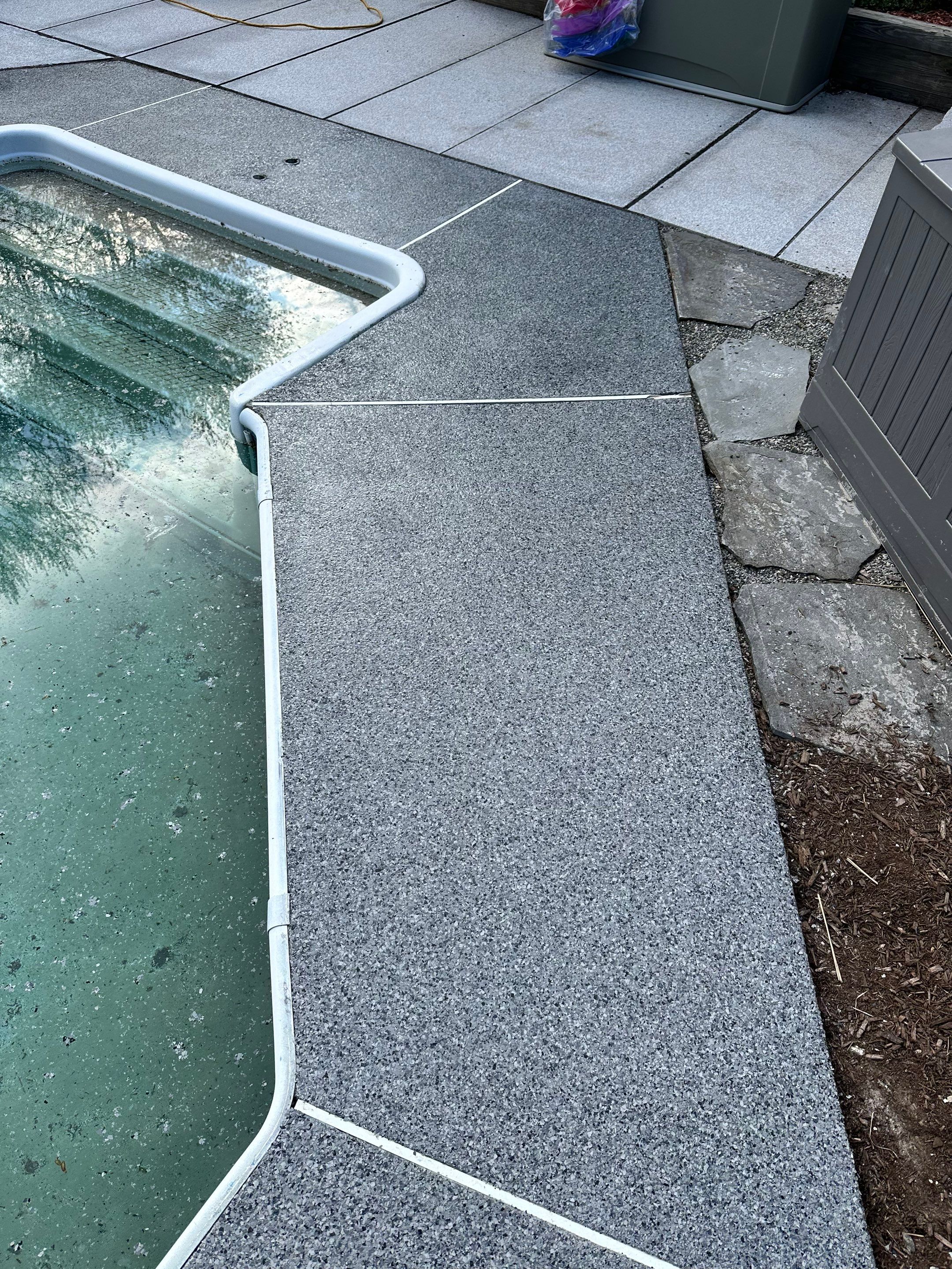 Poolside Concrete Floor Coating by DiGiorgi Roofing and Siding Inc