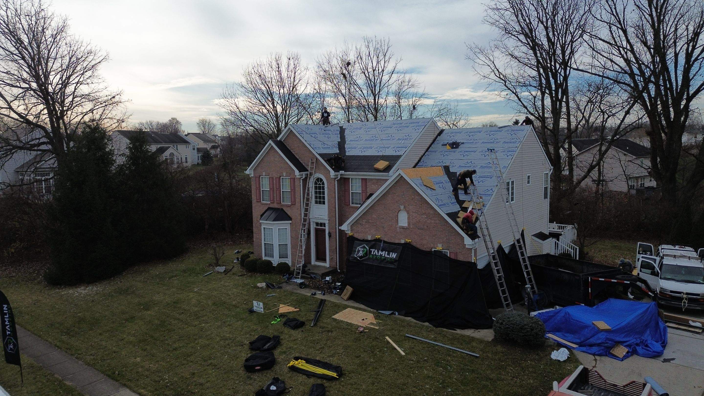 Walden Ponds - Pristine Black and Hydro Flo Gutter Guards by Tamlin Roofing