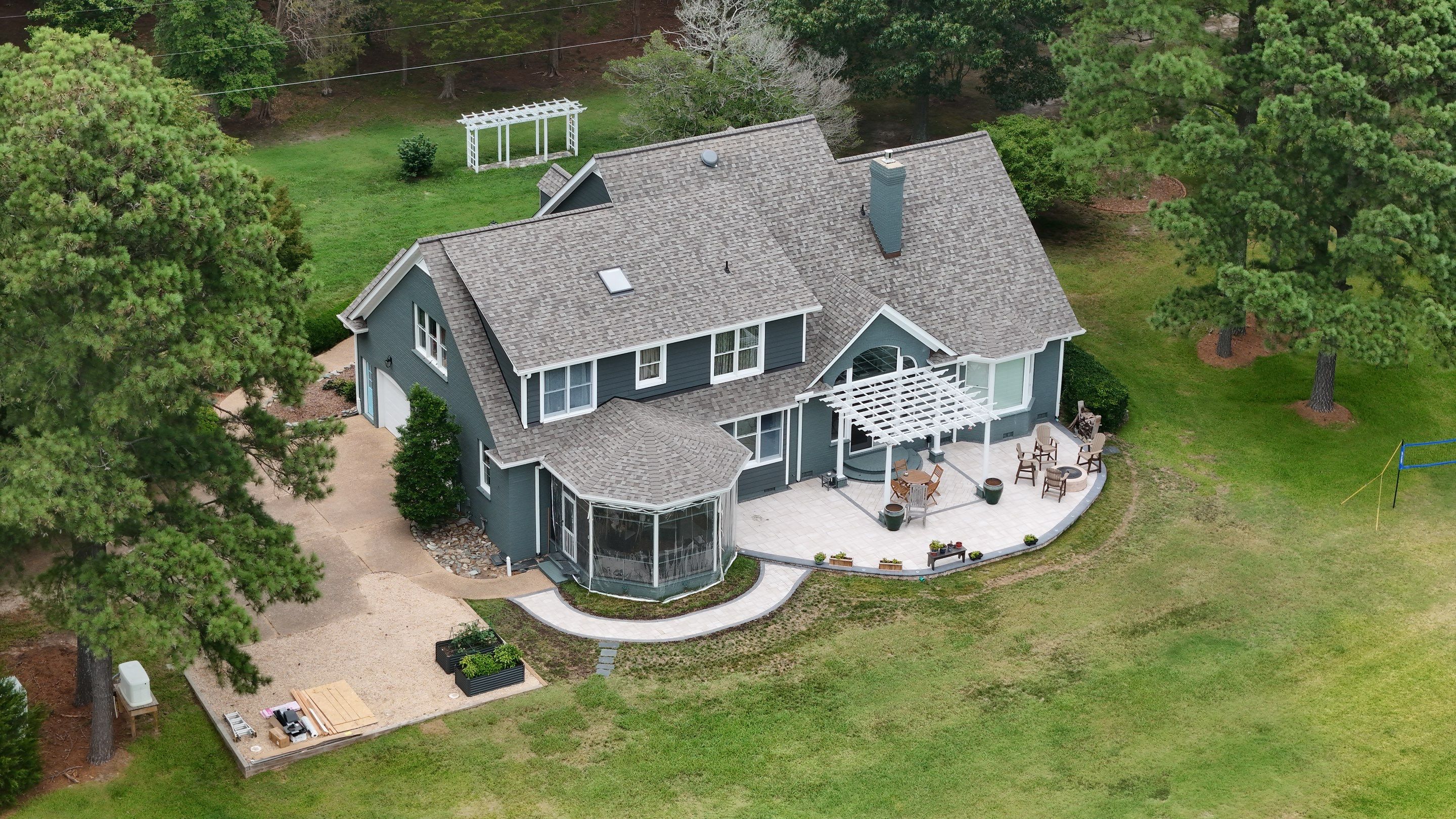 Roof Replacement and White Gutter Installation in Gloucester by Cade Construction