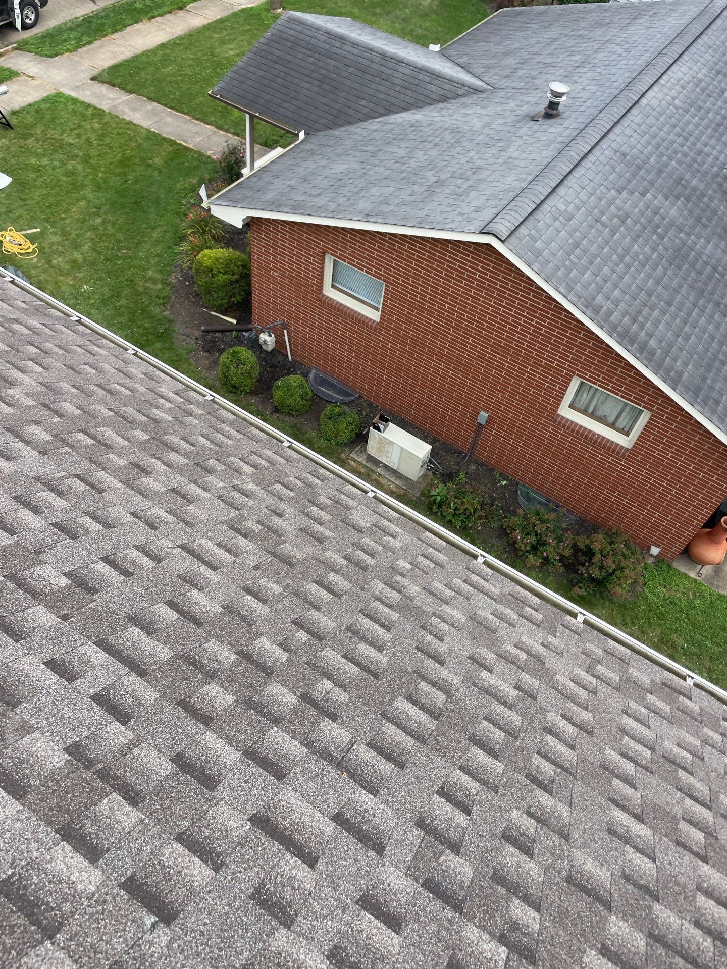 Residential Roofing Installation using GAF Timberline HDZ Charcoal by Rainstoppers Roofing