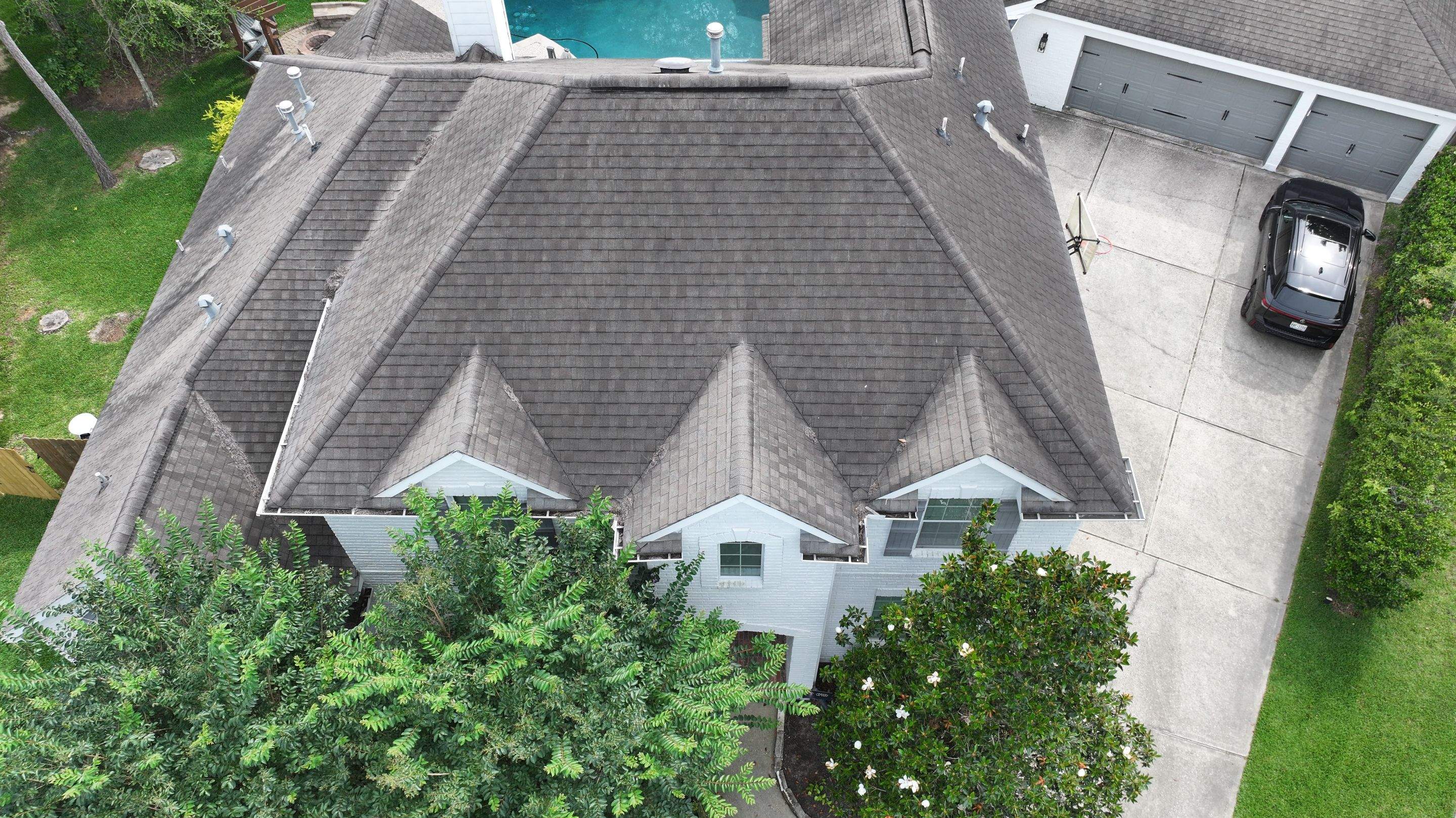 Roof Repair on Two-Story Estate Home — Spring, TX by PL Roofing & SB Roofing, LLC.