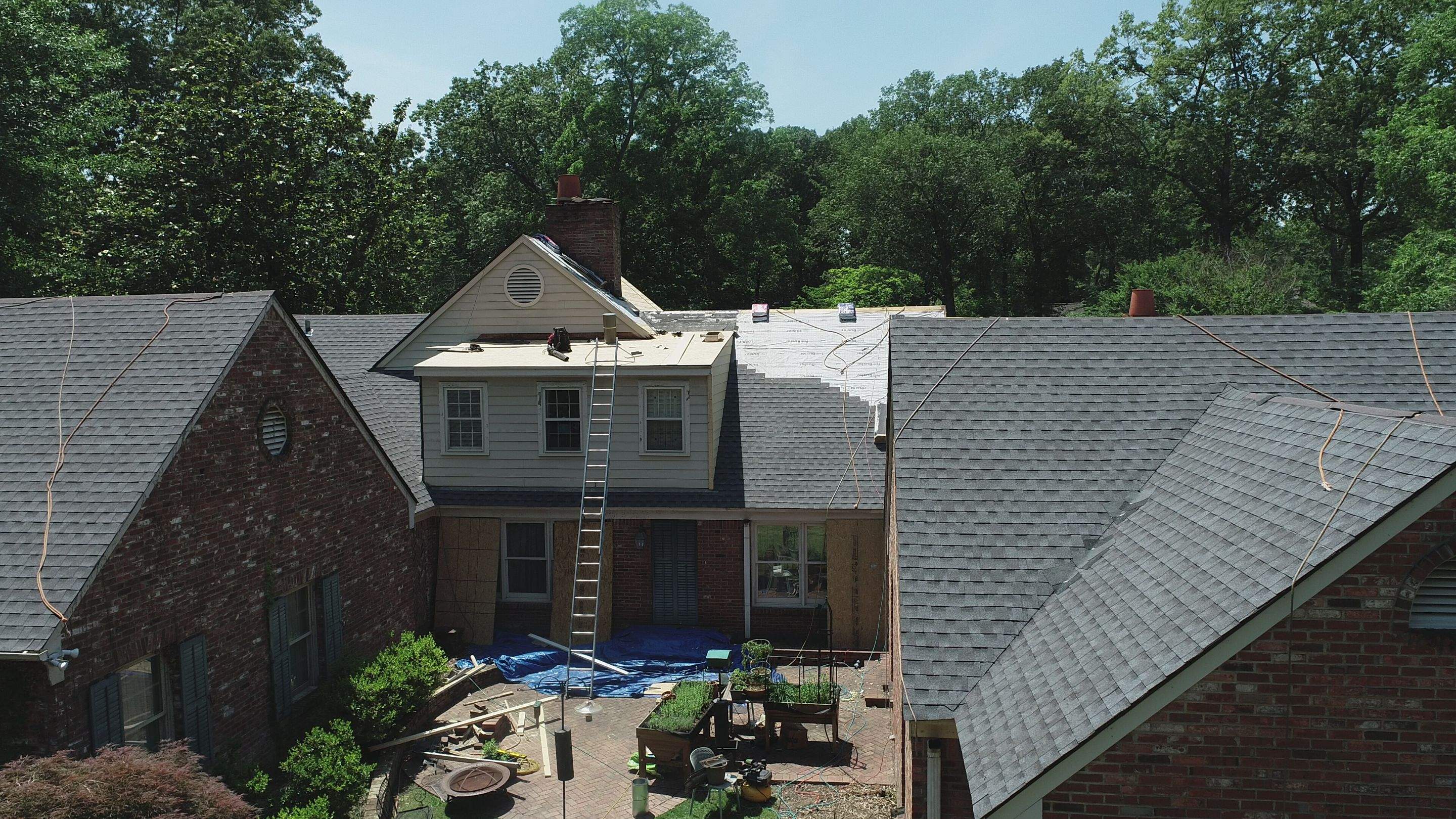 Full Roof Replacement with gutter upgrade after tree impact damage in East Memphis by Revival Roofing Services