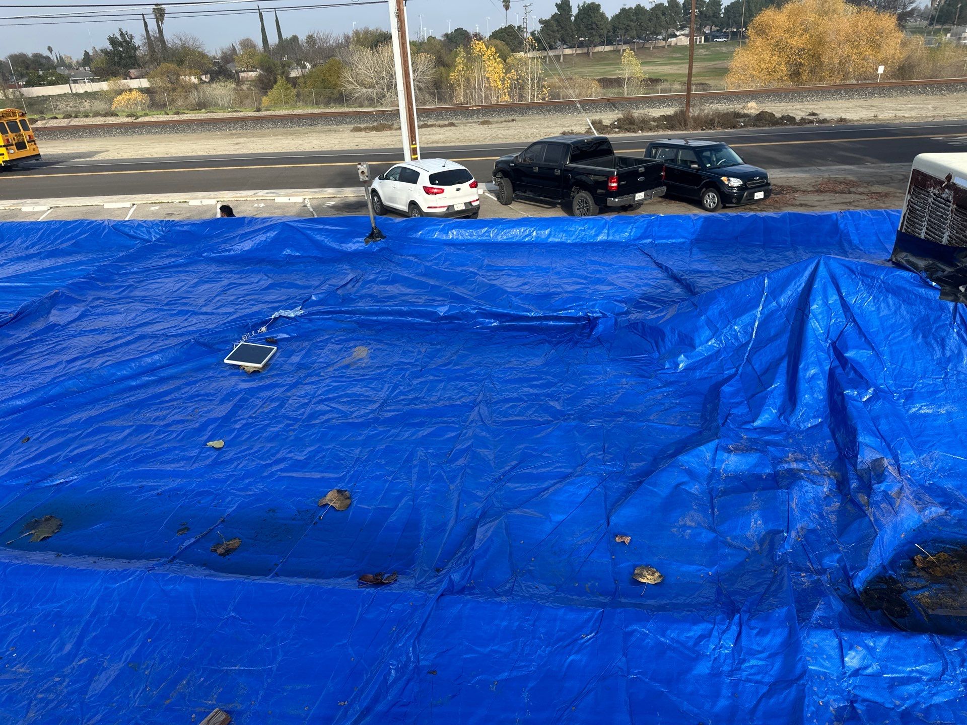 Emergency Roof Tarp Service - Fresno, CA by Grandmark Service Company