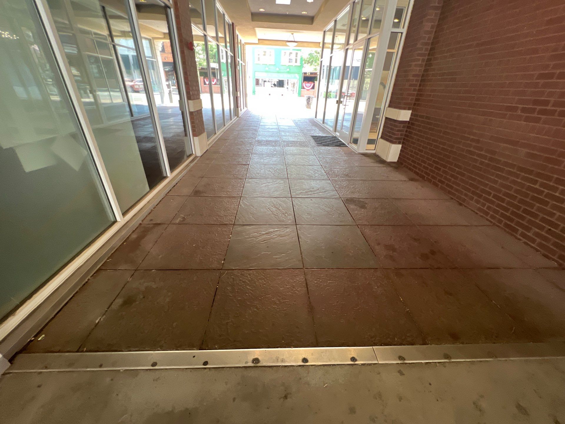 Parking garage using Hot water by Northern Power Washing LLC.