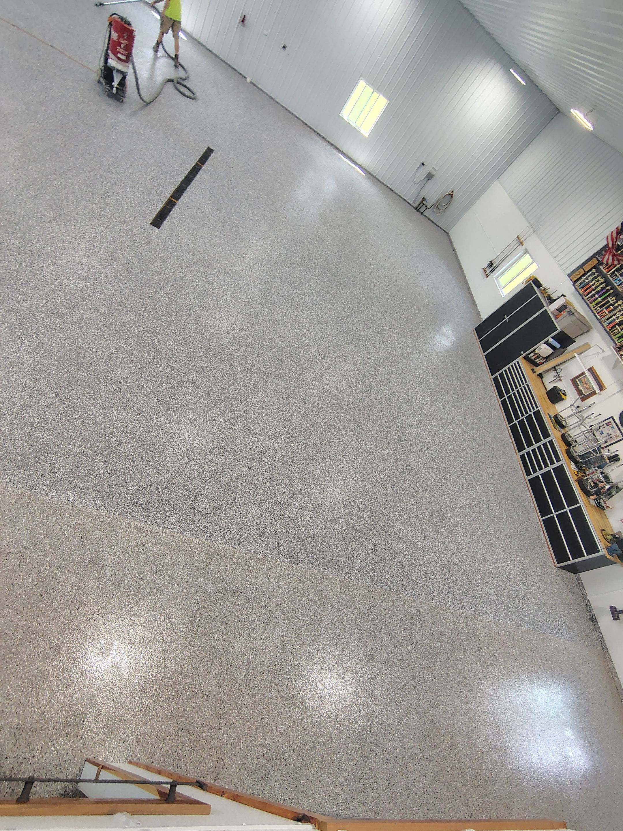 Multi-Stage Concrete Floor Coating for Egan Shop and RV Storage by Select Painting, Coatings & Garage Cabinets