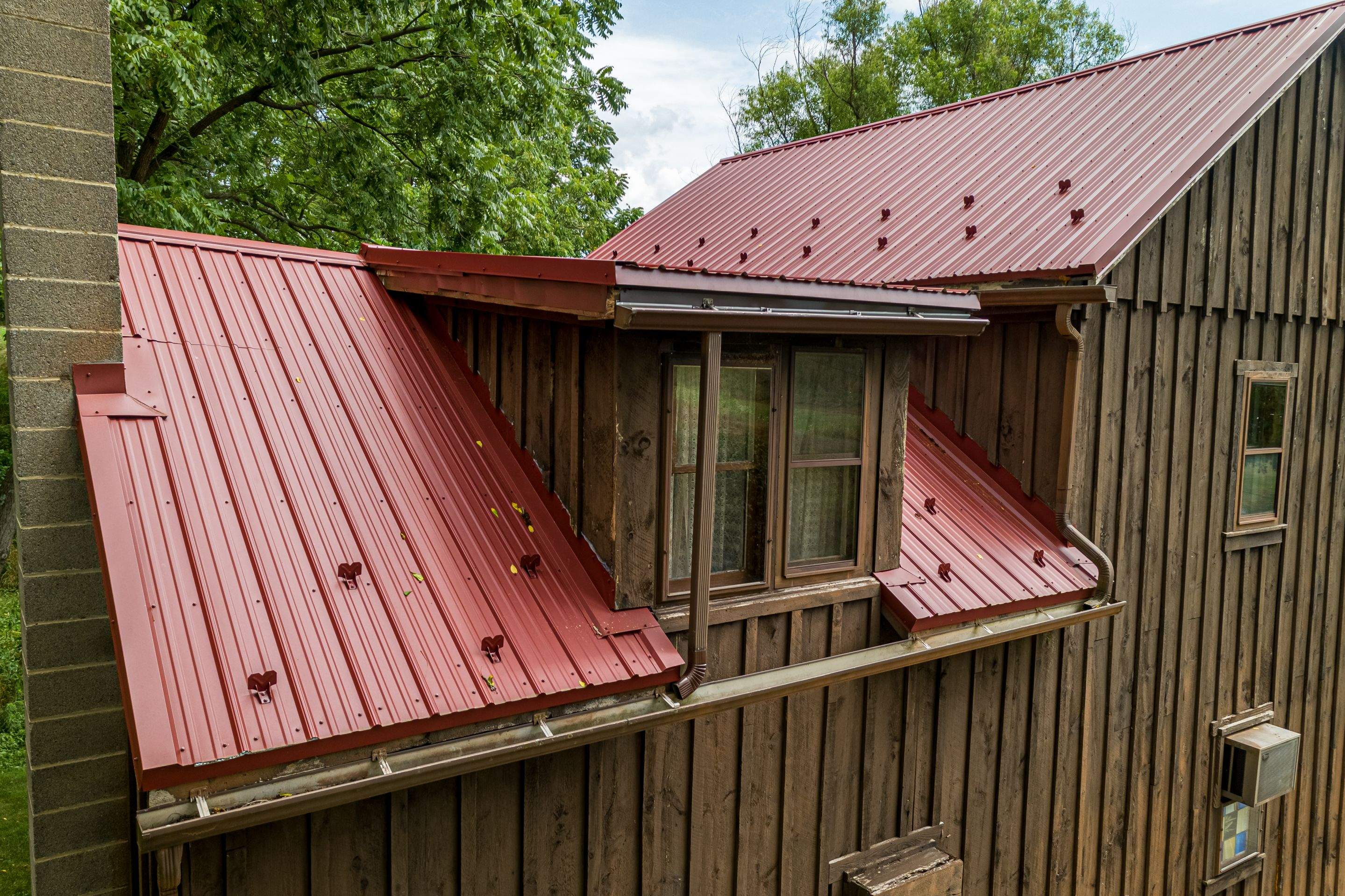 Metal Roof-colonial red by Esh Builders