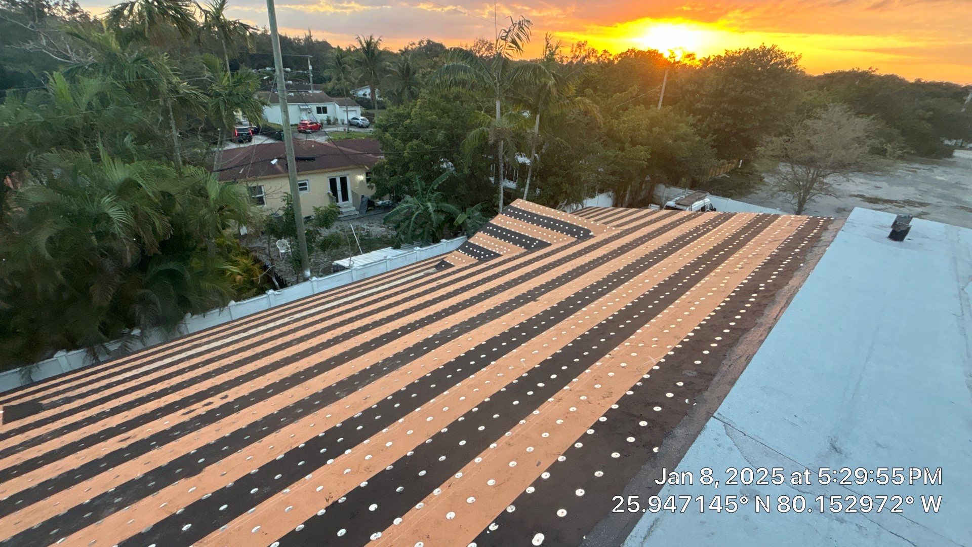 COMMERCIAL REROOF 24 GUAGE MEDIUM BRONZE 1-1/2" MECHANICAL SEAM "ZEBRA METHOD" by Earl W. Johnston Roofing 