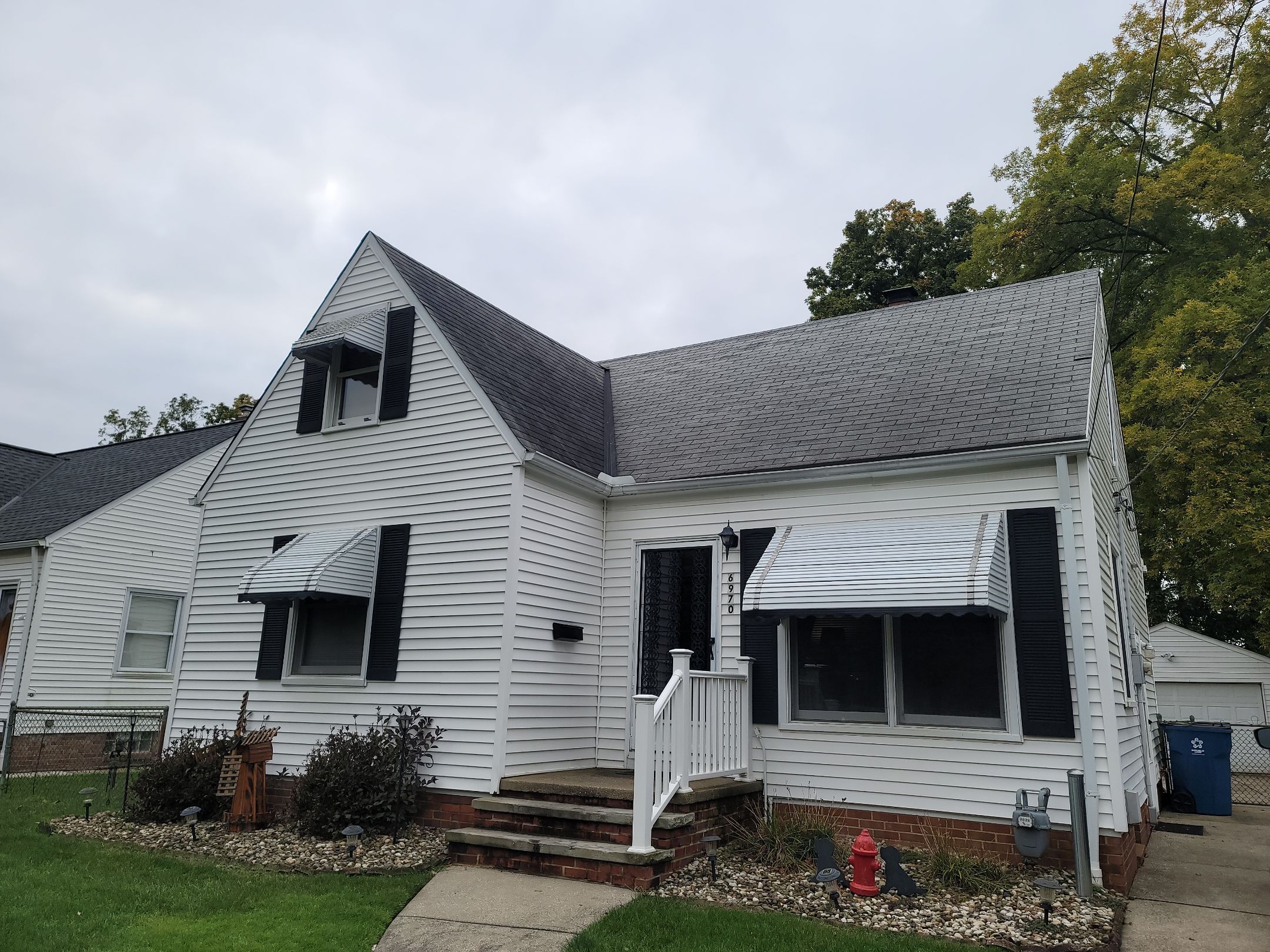 ATLAS PINNACLE COLOR: BLACK SHADOW DRIP EDGE: WHITE by Eagle Eye Roofing