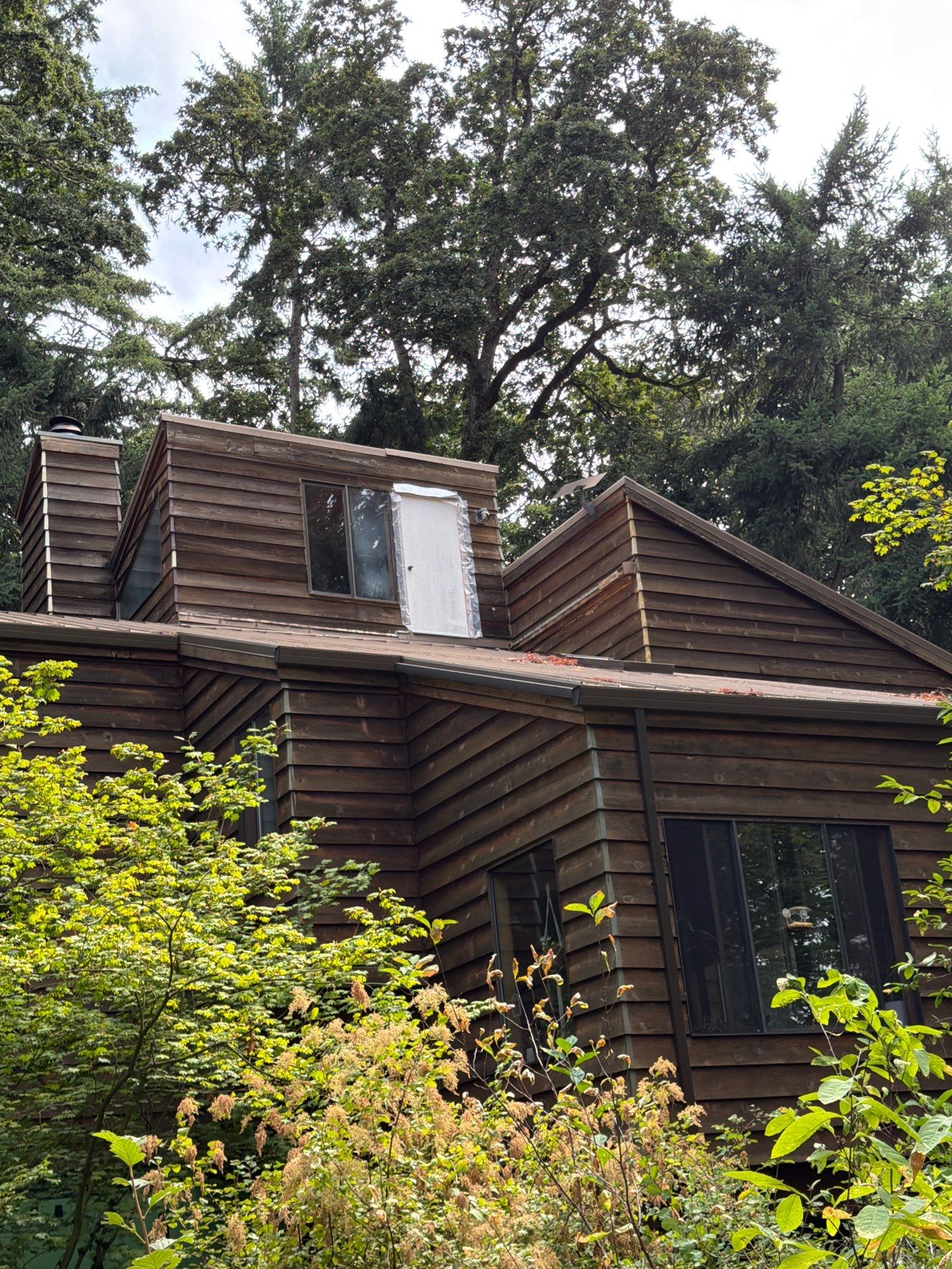 Cedar Siding Replacement on the Chimney by Handyman State LLC