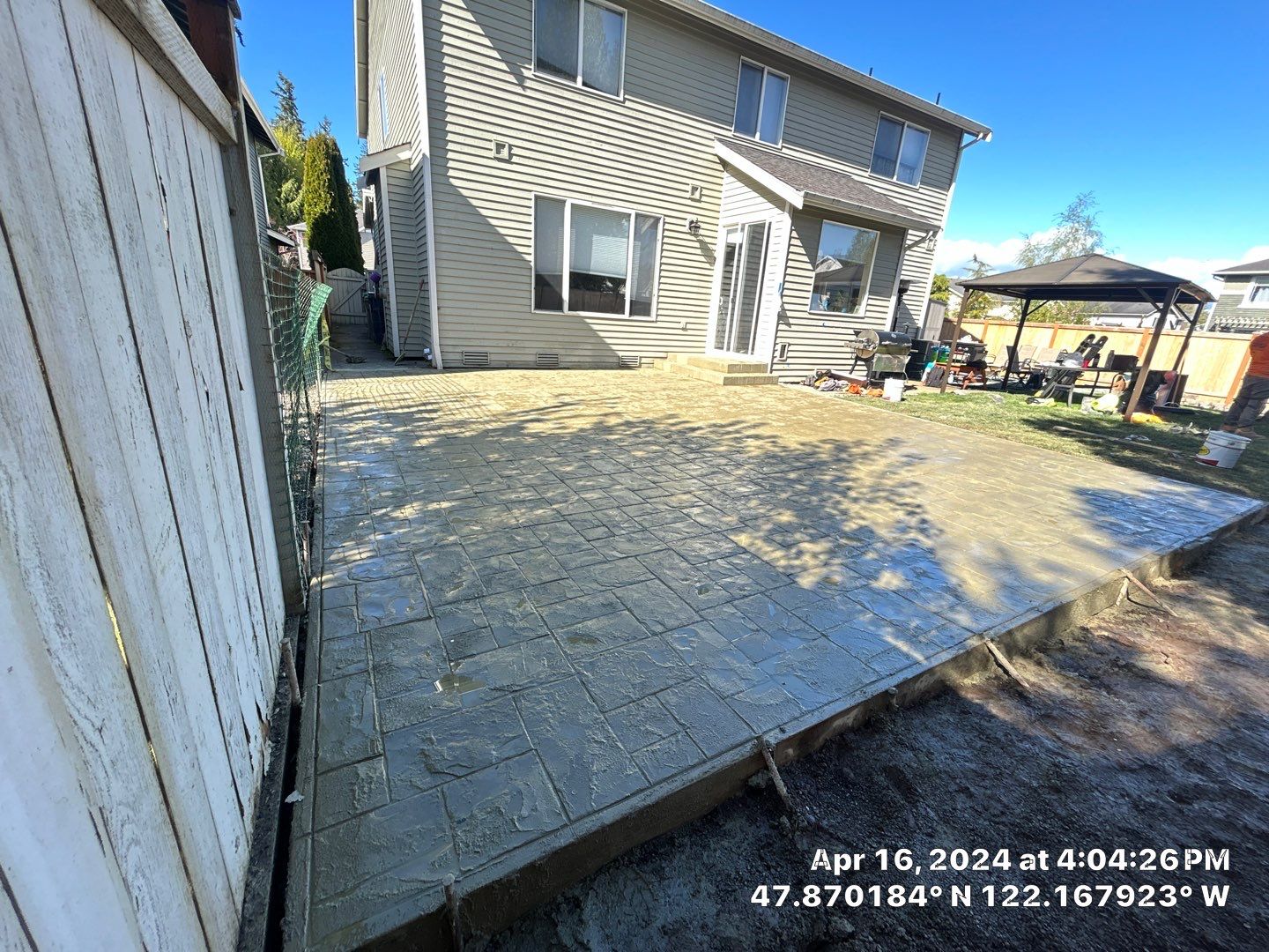 Benedict | Stamped Concrete Back Patio by Jireh Asphalt & Concrete Inc 