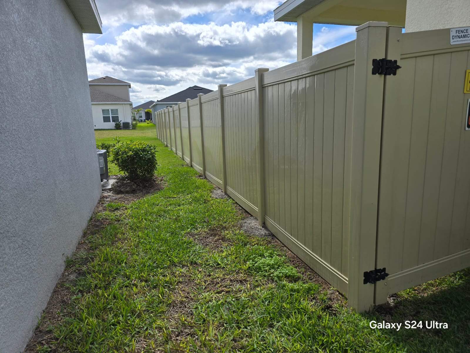Tan Vinyl Privacy Fence Repair in Port Charlotte by True Fence LLC