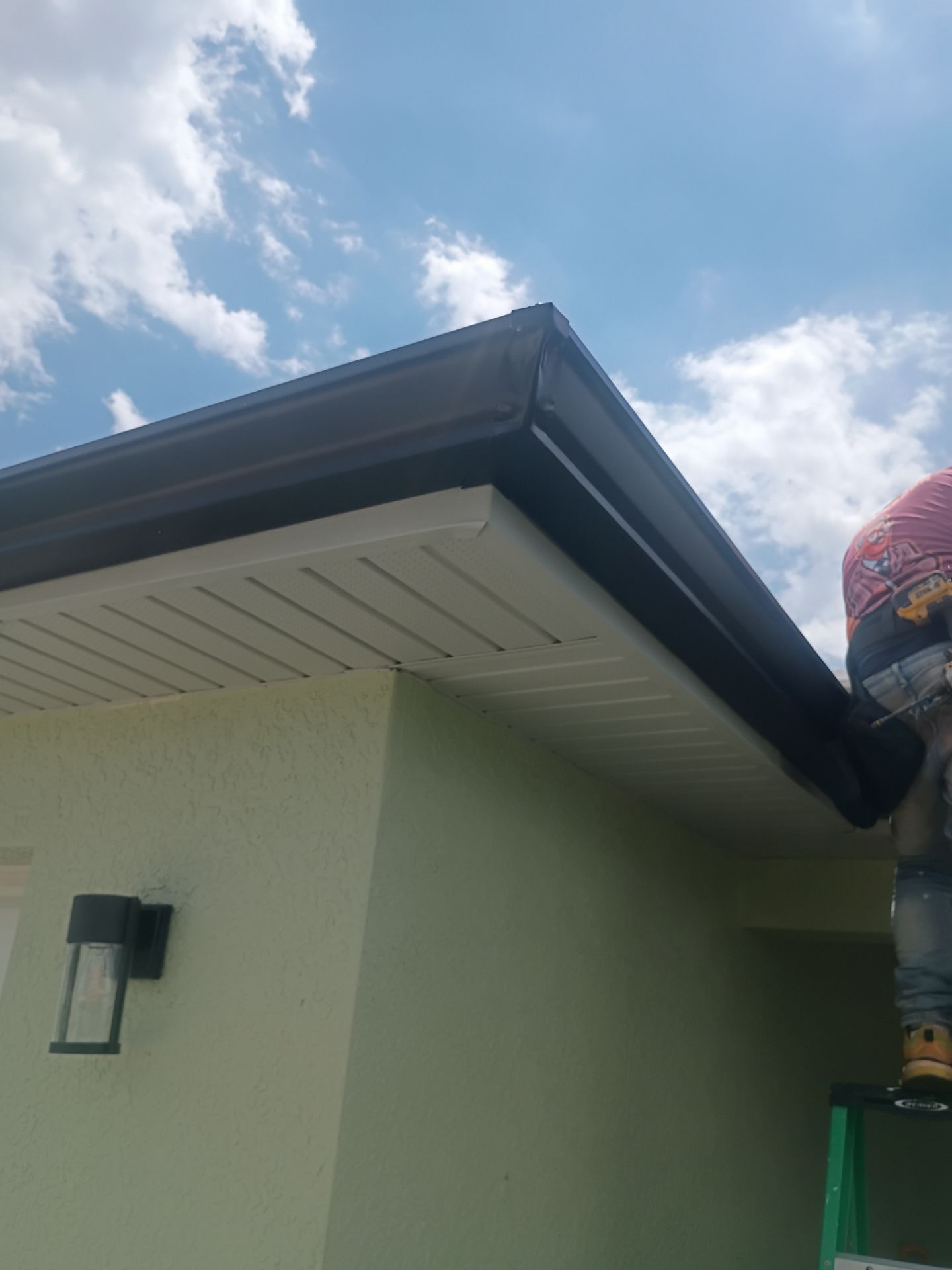 Black Seamless Gutters using K-Style Seamless Gutters in Cape Coral FL by Gutter Professors