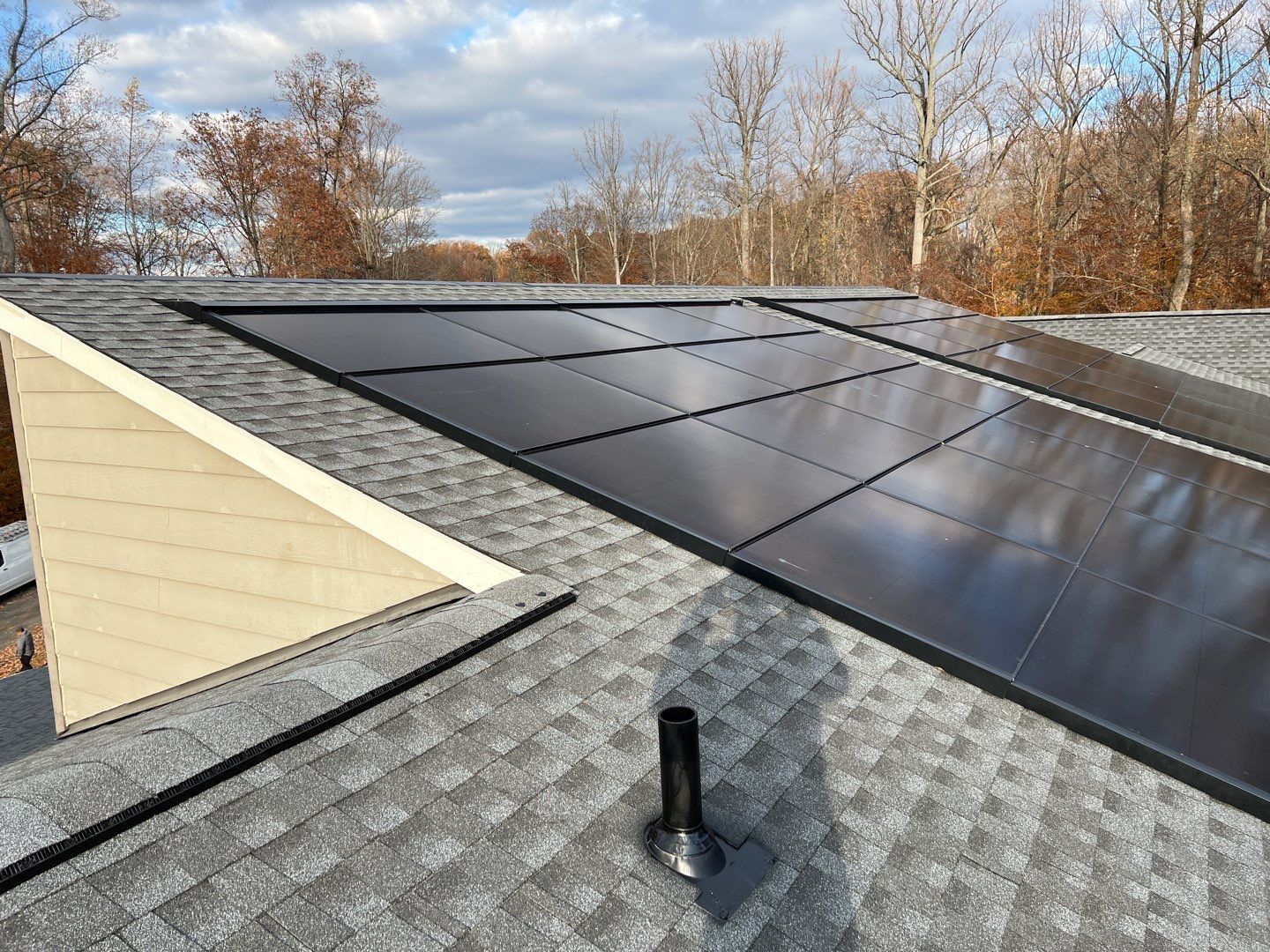 Solar Roof using GAF Decotech integrated panels by American Home Contractors