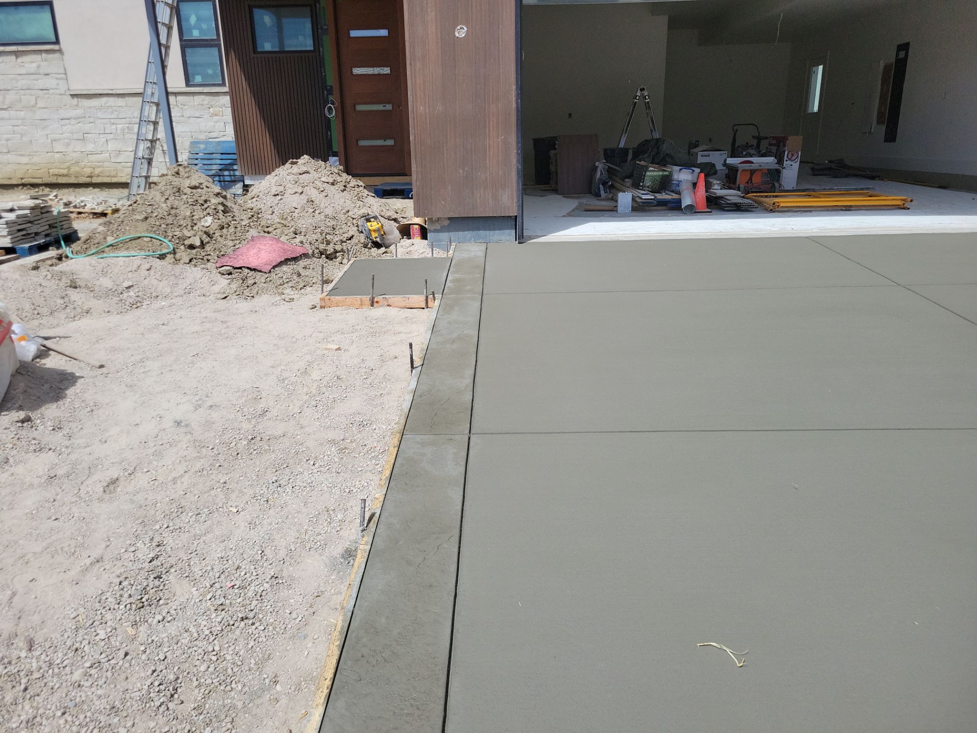 Stamped Concrete Patio and Custom Walkway Installation in Berthoud, Colorado by Center Line Concrete
