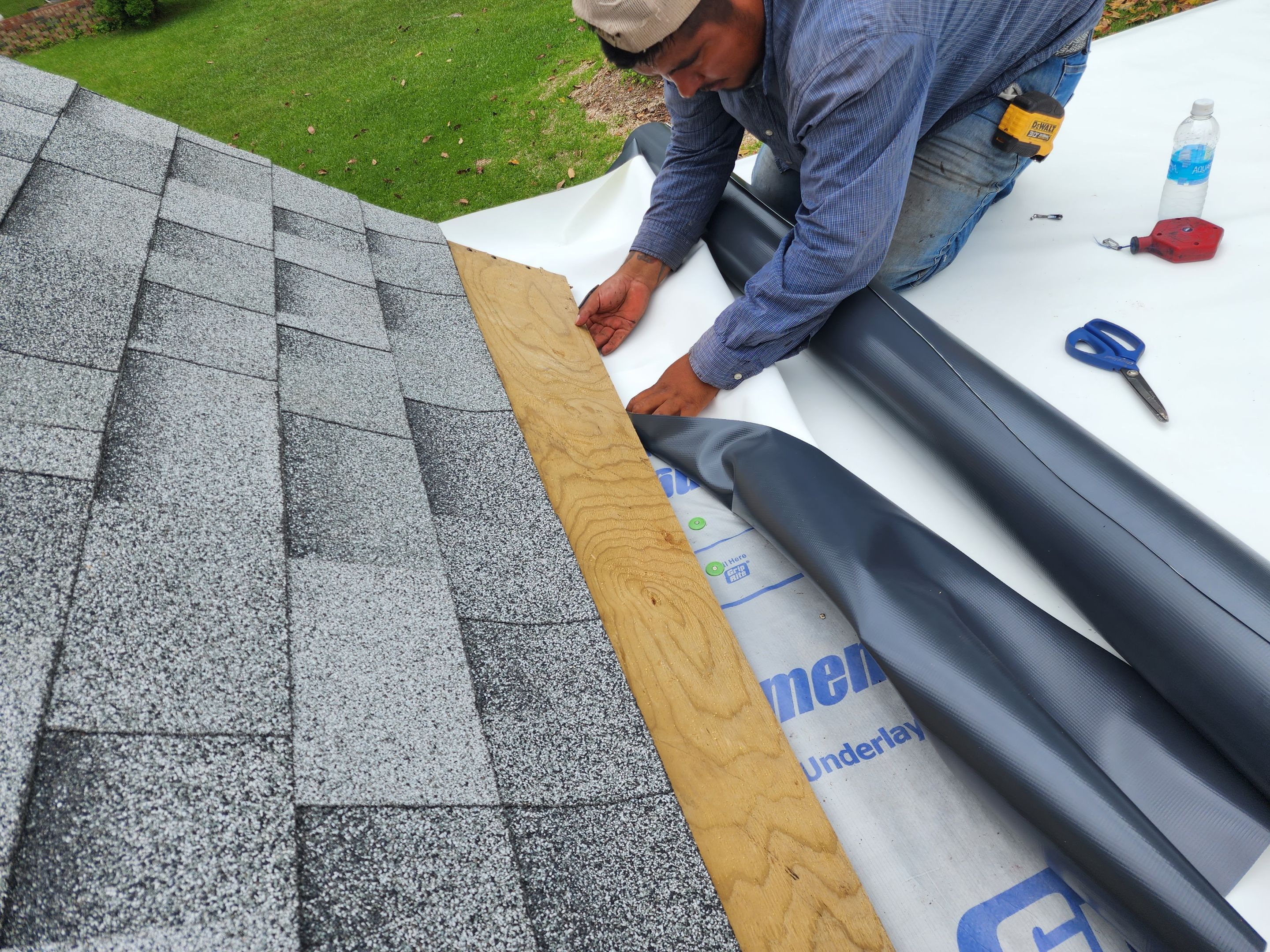 Residential Roofing Installation using 50 mil PVC by Hostetler Roofing