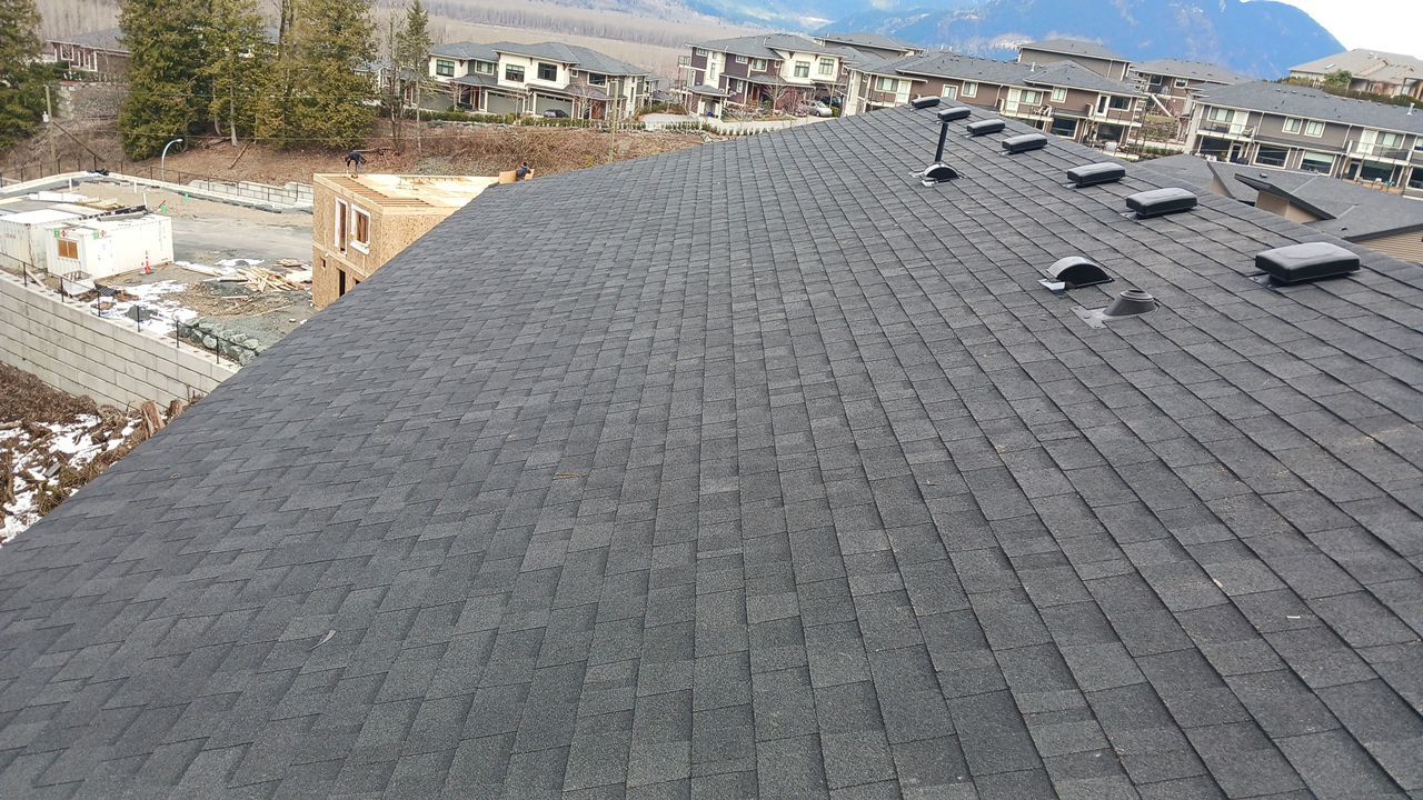 Residential Roofing Installation using OC Oakridge shingles by Top Notch Roofing Inc