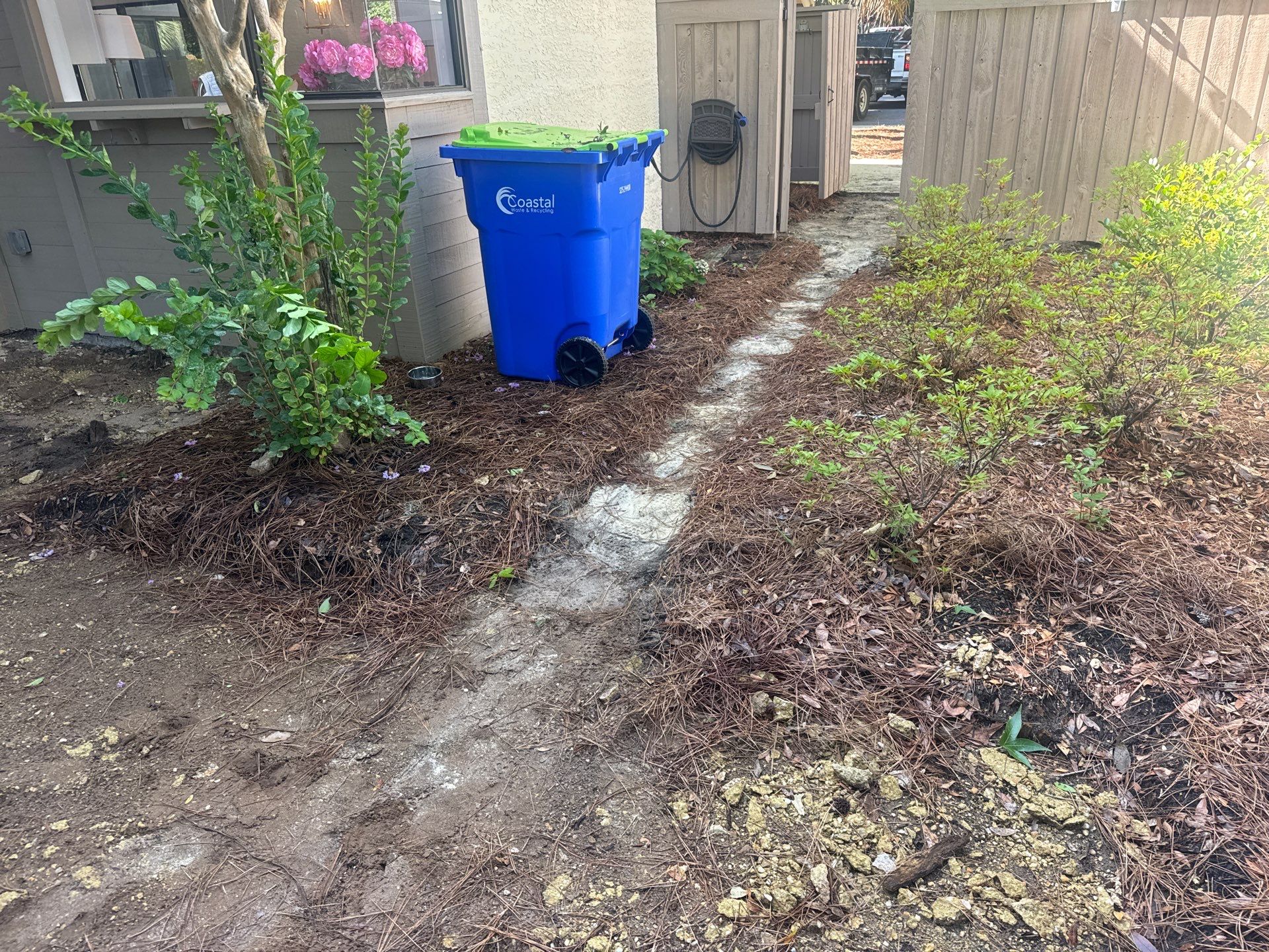 Custom Concrete Patio and Herringbone Paver Walkway in Hilton Head Island by Lowcountry Scapes, LLC