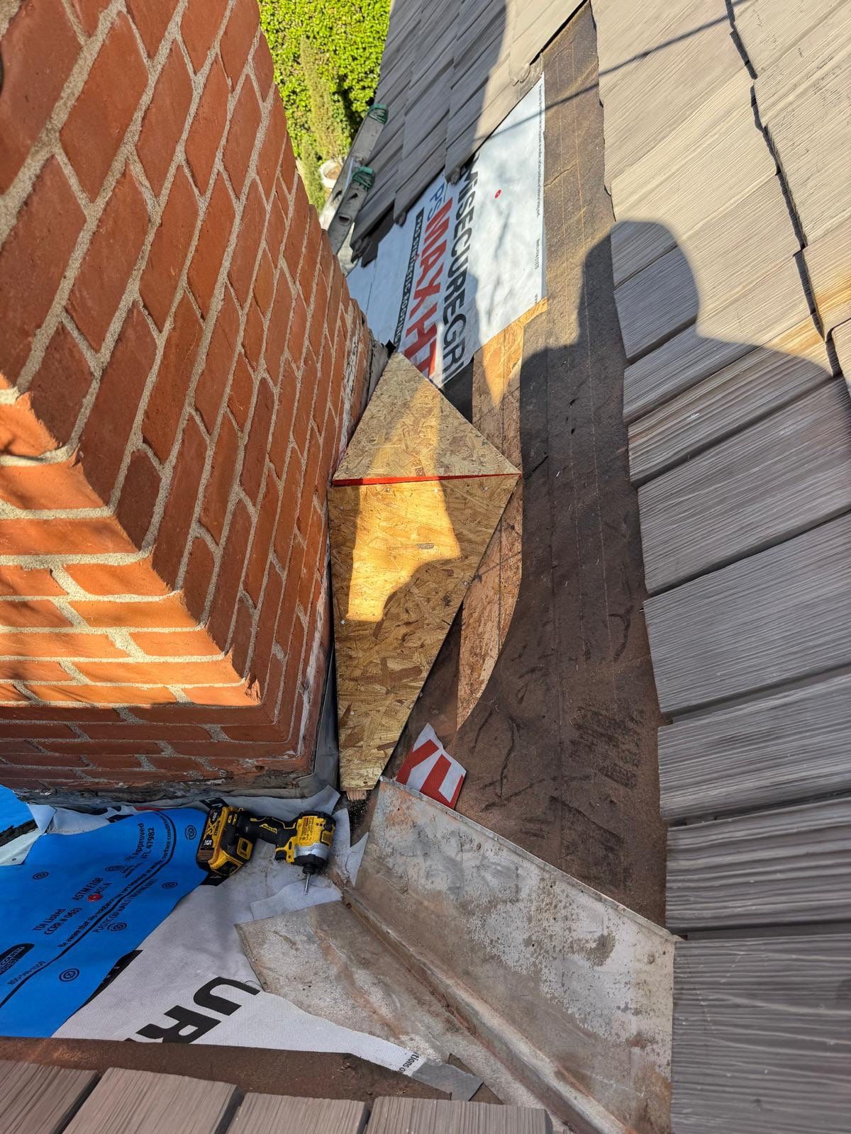 Composite Shake Roofing and Custom Chimney Cricket Installation in San Diego by Westmark Roofing