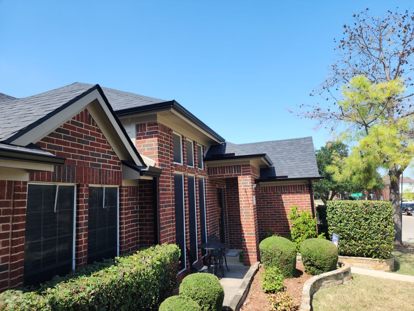 Exterior Makeover Reroof, Gutters and Exterior Paint by Tex-Line Roofing