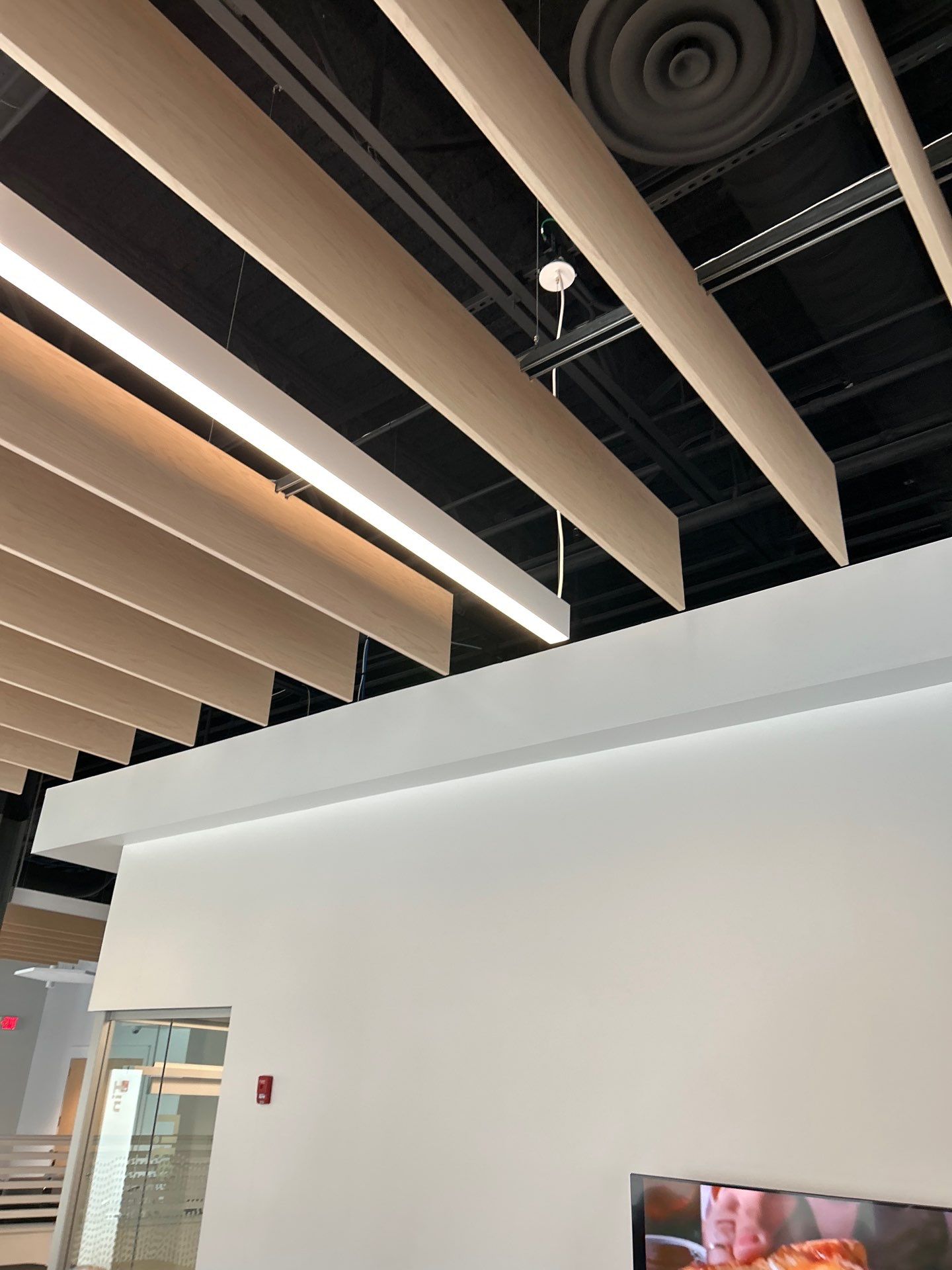 Office Remodel Featuring Acoustic Baffles and Professional Carpet Installation by CompanyCam Sales Demo