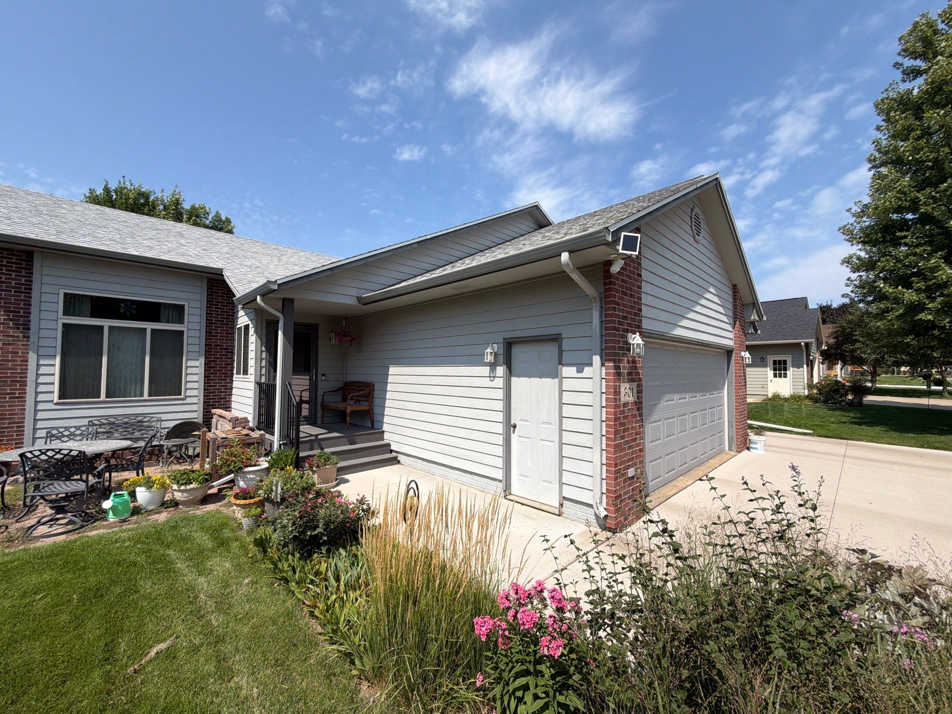 Exterior Painting for Vinyl Siding and Trim in Sioux Falls by Select Painting, Coatings & Garage Cabinets