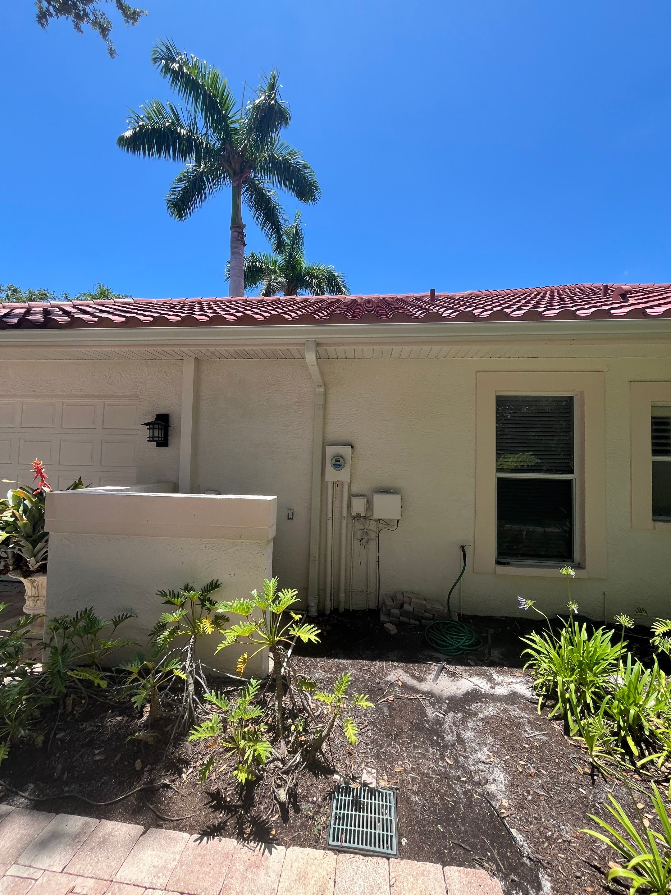 Splash Guard Gutters for Rainy Season Protection in Osprey FL by Gutter Professors