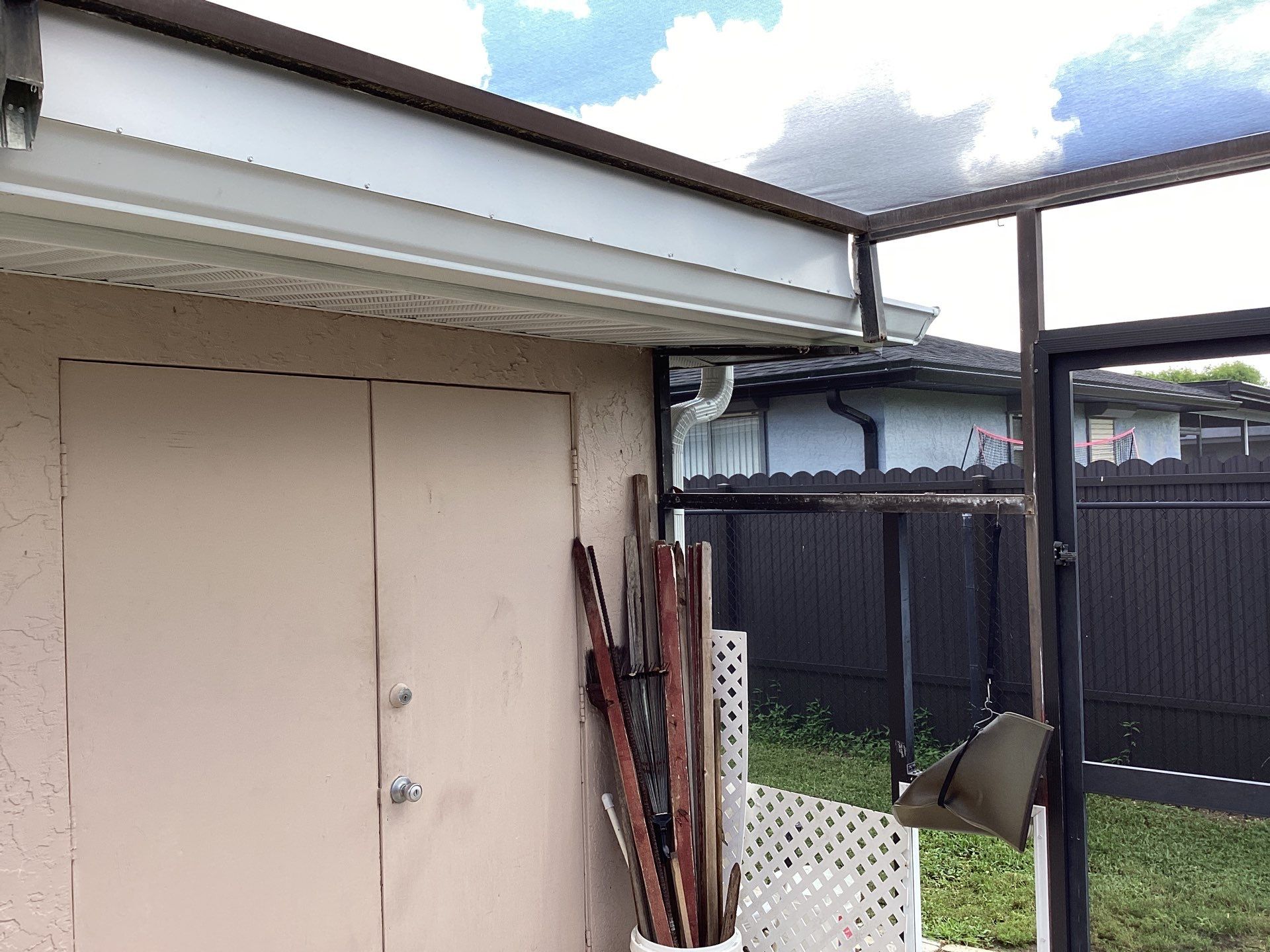 White Seamless Gutters and Splash Guards in Fort Myers FL by Gutter Professor by Gutter Professors