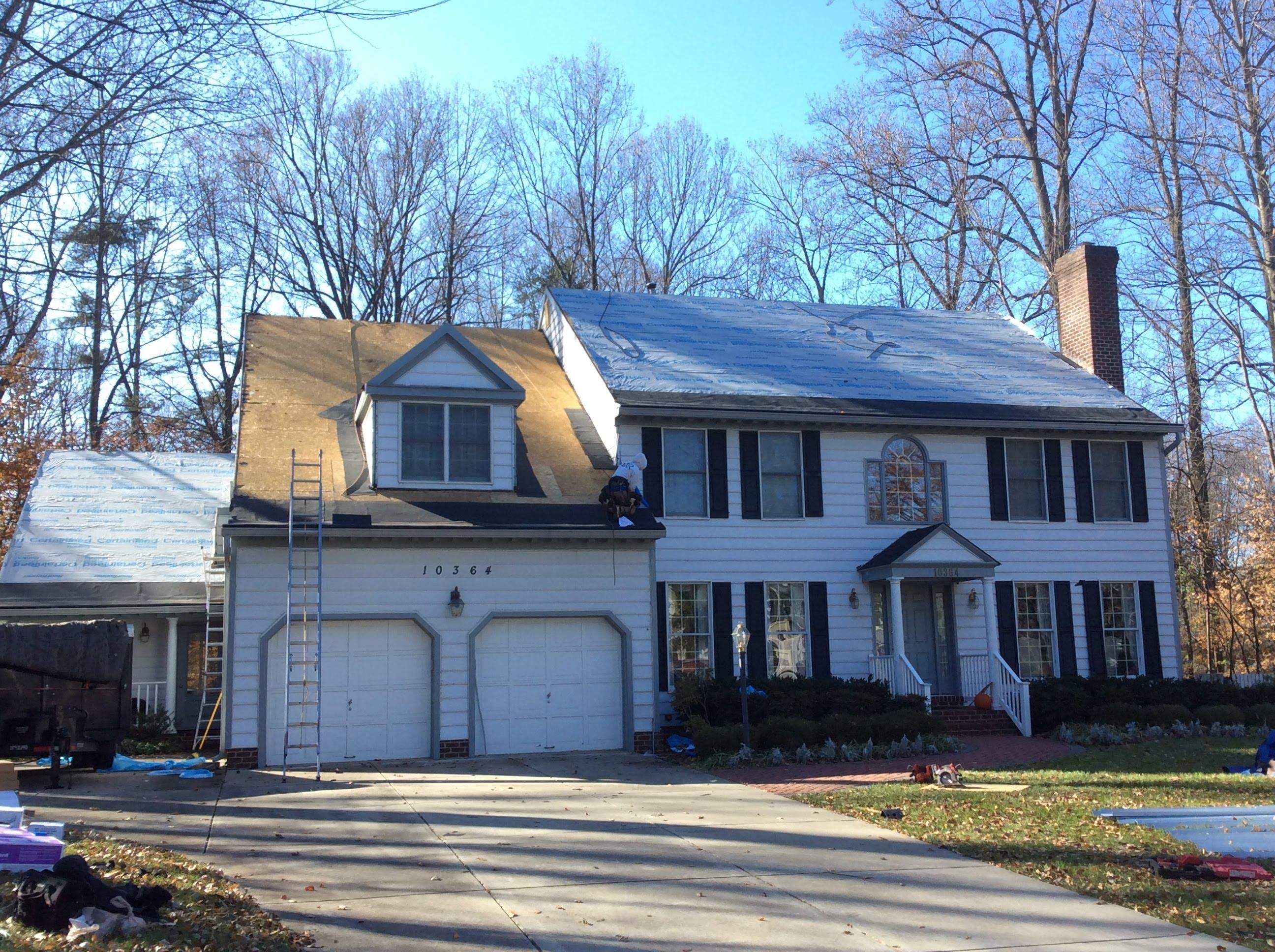 Residential Roofing Installation using Charcoal Black by Alpha Design Services