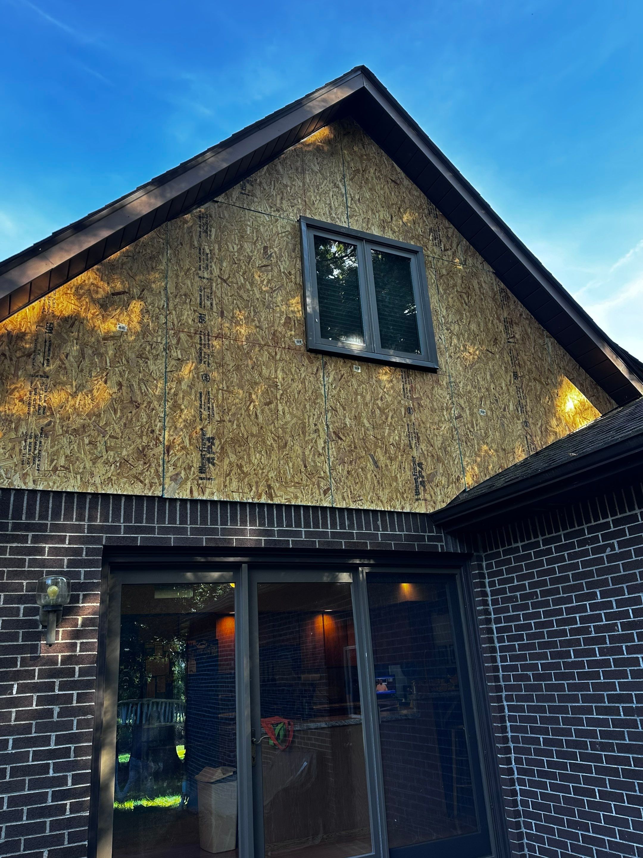 Custom hardie  by Cousins Roofing Siding & Decks