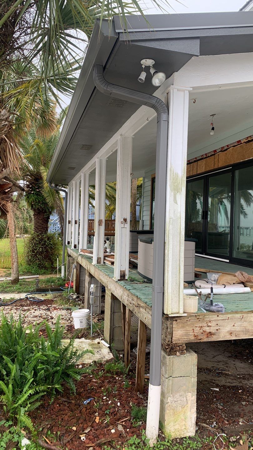 Seamless Gutter Installation using Charcoal Grey Gutters by Gutter Professors
