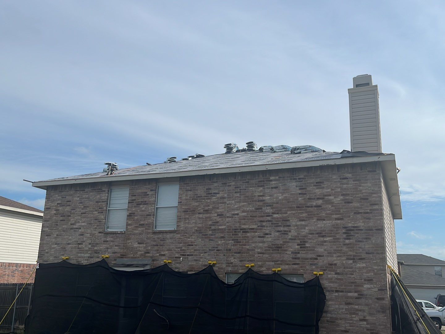 Full Roof Replacement, Chimney Rebuild and Interior Damage Replacement by First United Roofing & Construction