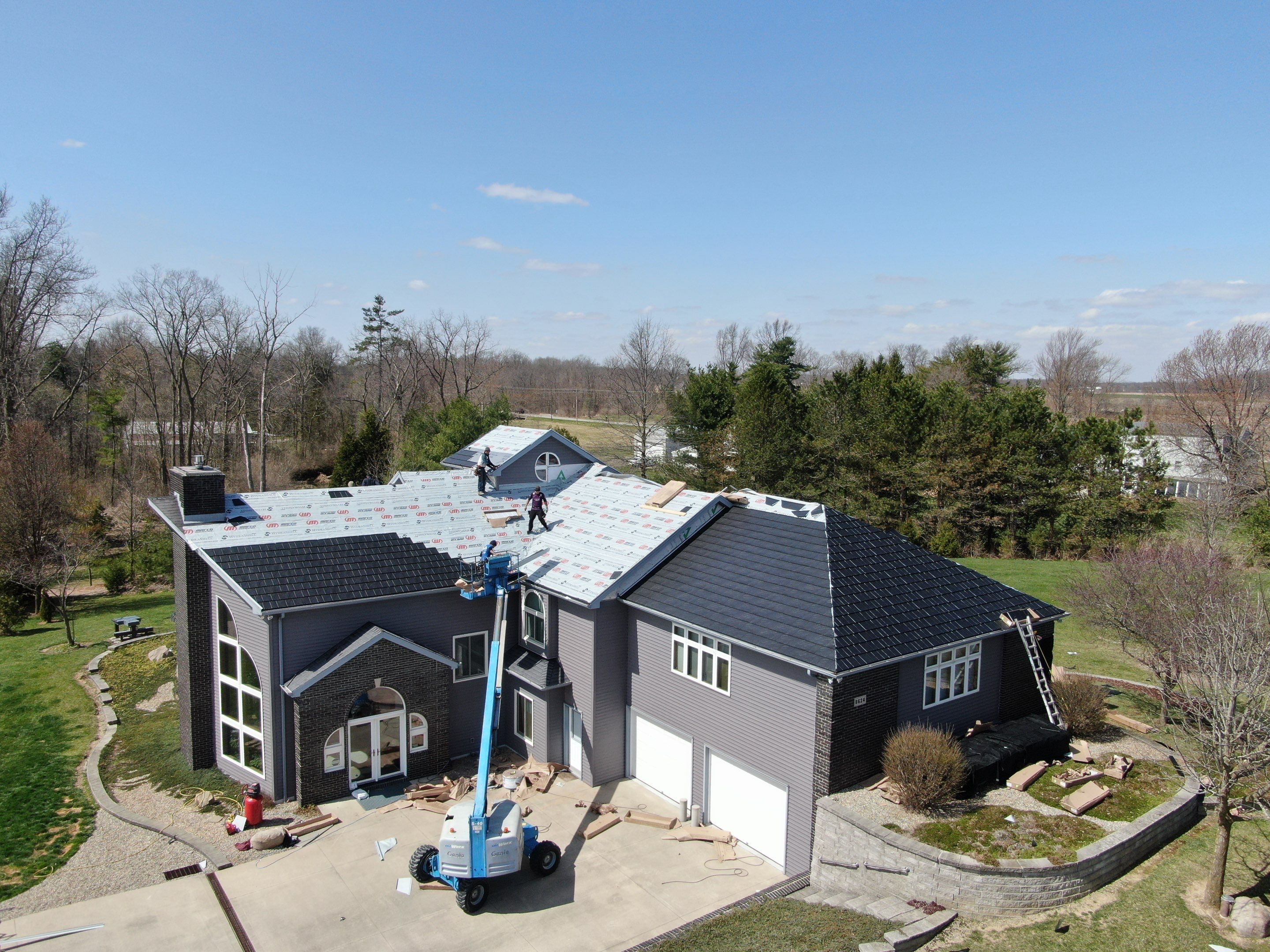 Residential Roofing Installation using Vic West Nothridge Slate by 4Ever Metal Roofing