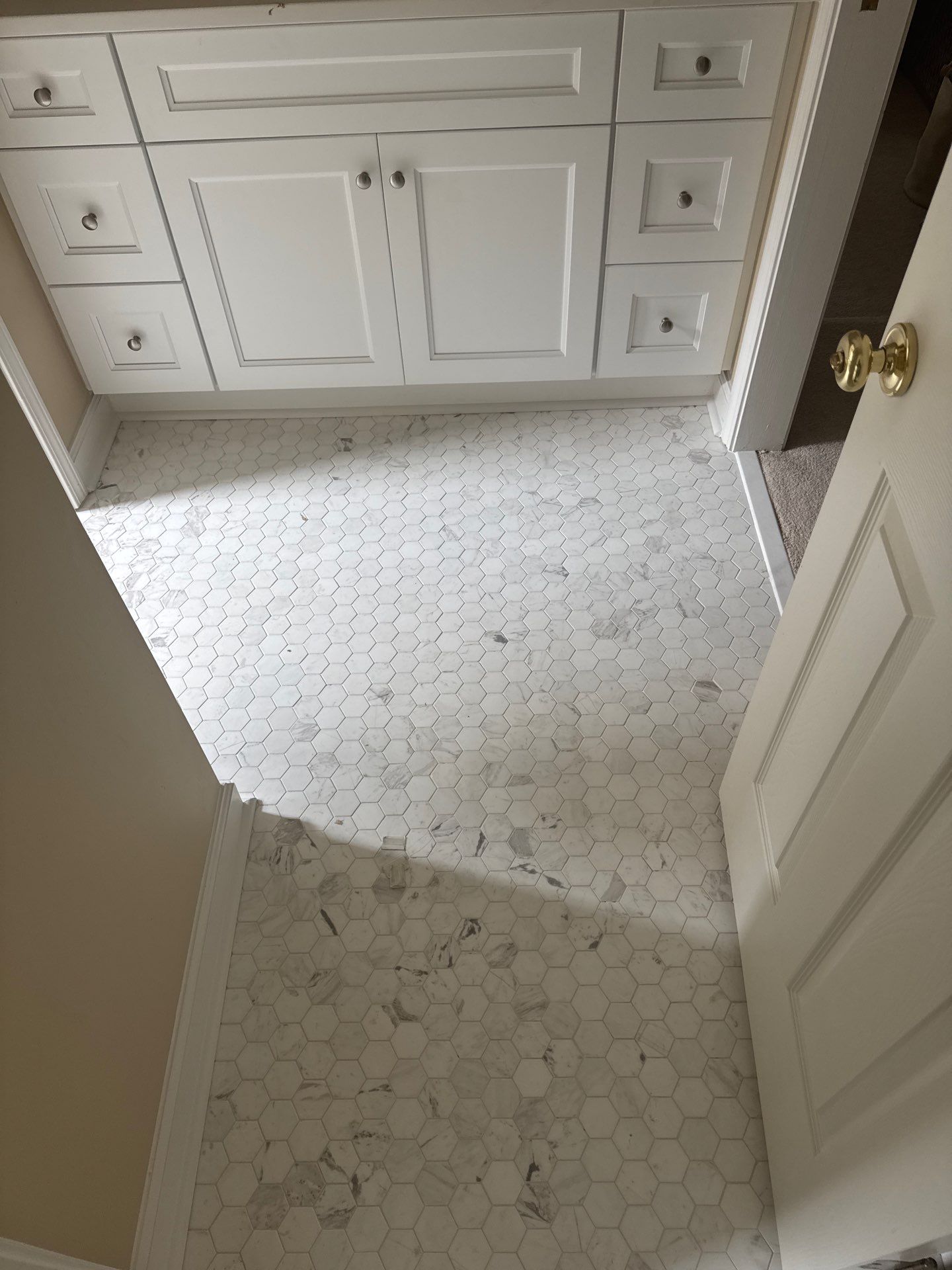 Marietta Bathroom and Laundry Room Floor and Vanity Remodel by Swift Home Renovations