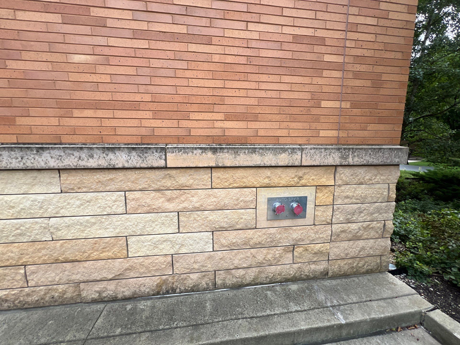 natural stone using Algaecide, soft wash soap by Northern Power Washing LLC.