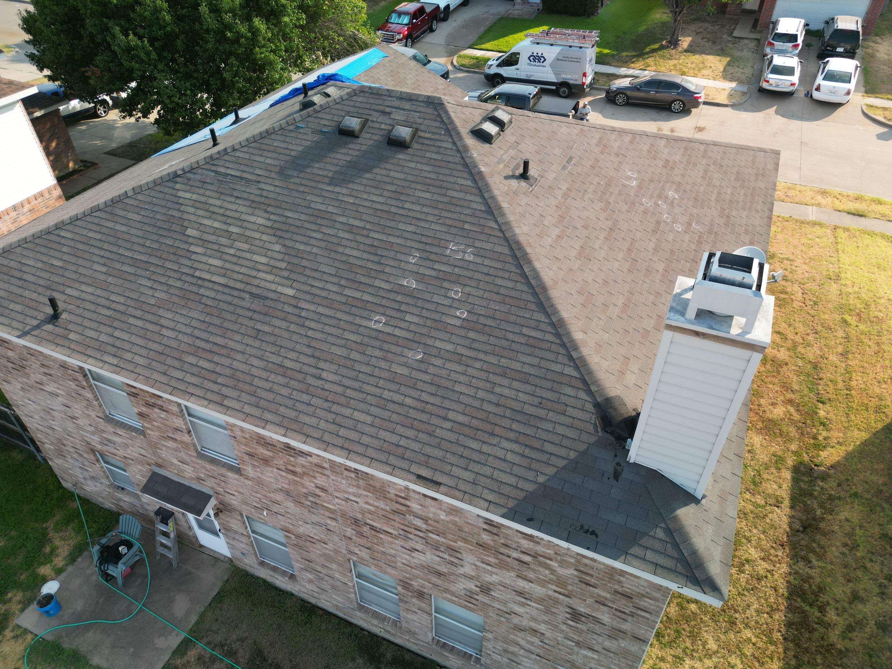 Full Roof Replacement, Chimney Rebuild and Interior Damage Replacement by First United Roofing & Construction