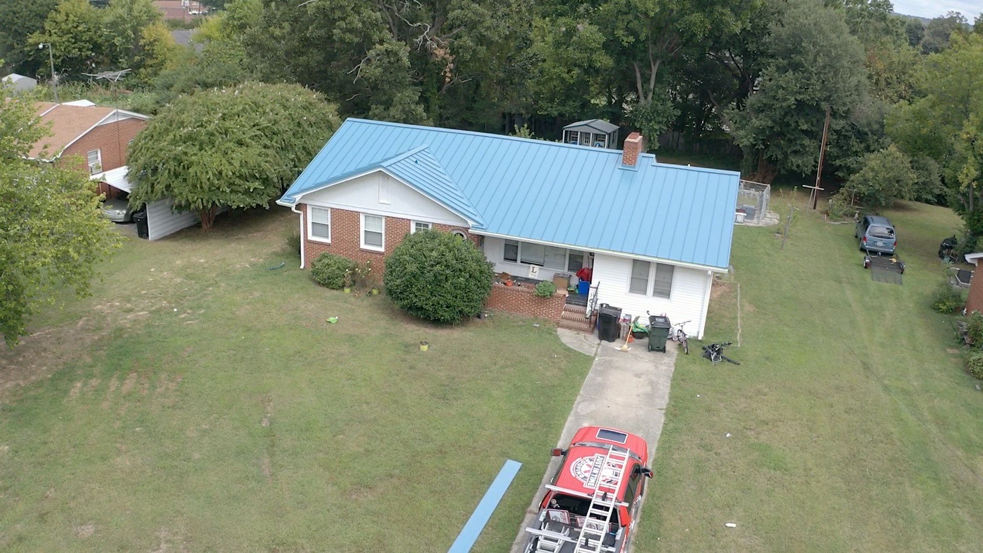 Carolina Blue Standing Seam Roof by Just In Time Roofing and Restoration