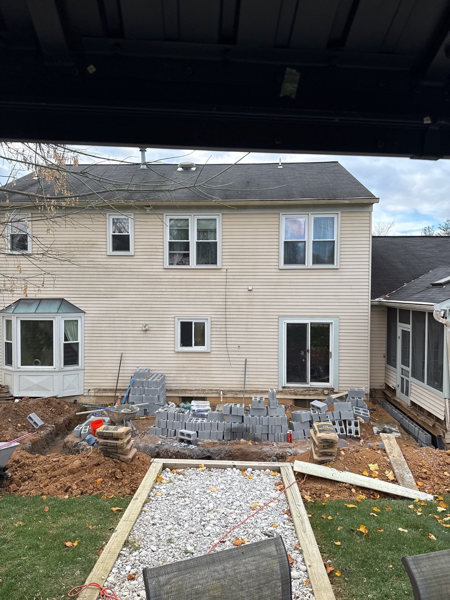 Sun room  using Concrete wood lumber, insulation , drywall, painting , cabinets , laminate floor  . by Jesus Master Handyman LLC 