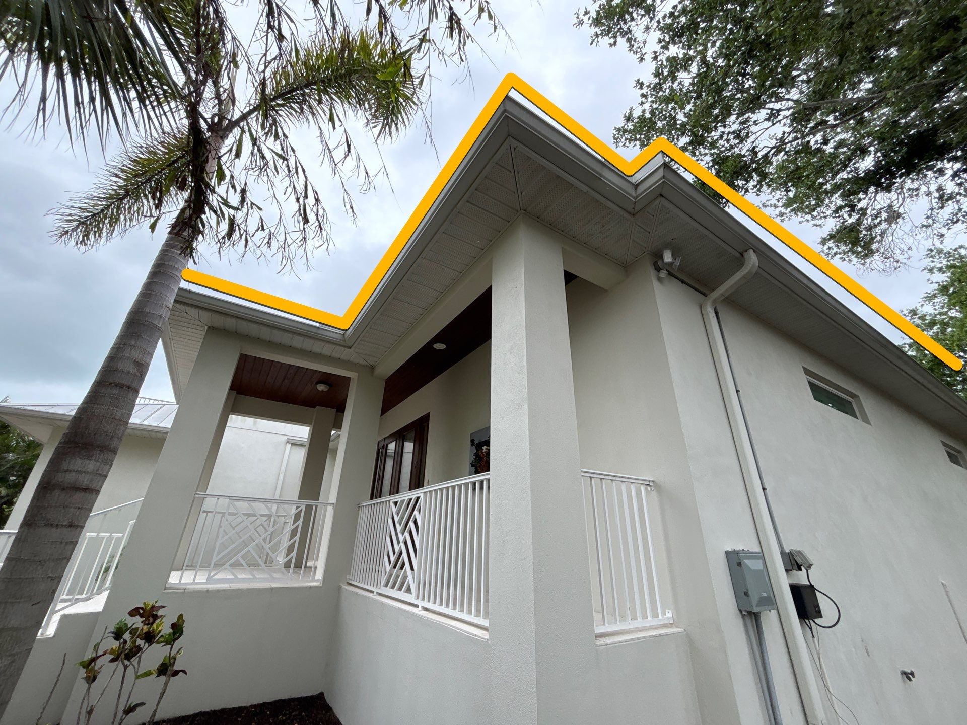 6-Inch White Seamless Gutters Installation in Siesta Key FL by Gutter Professors
