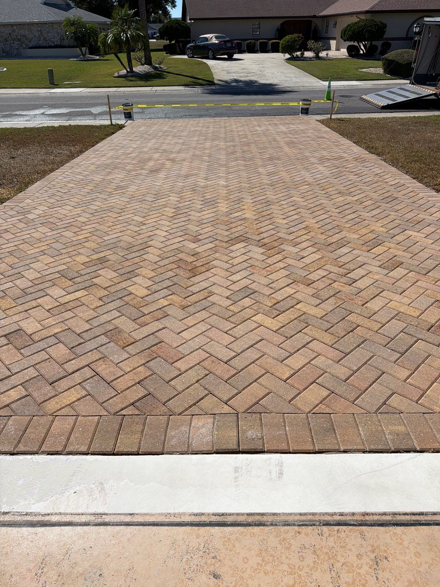 Restoring Herringbone Paver Driveway and Walkway in Sun City Center by Supreme Paver Experts