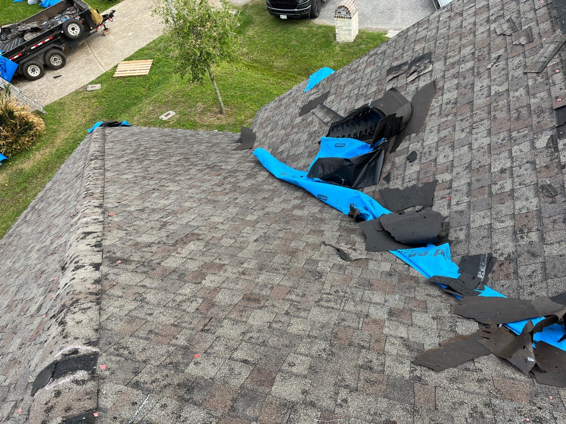 Hail Damage using Owen's Corning Duration (Lifetime) Shingles by Roof Repair Company
