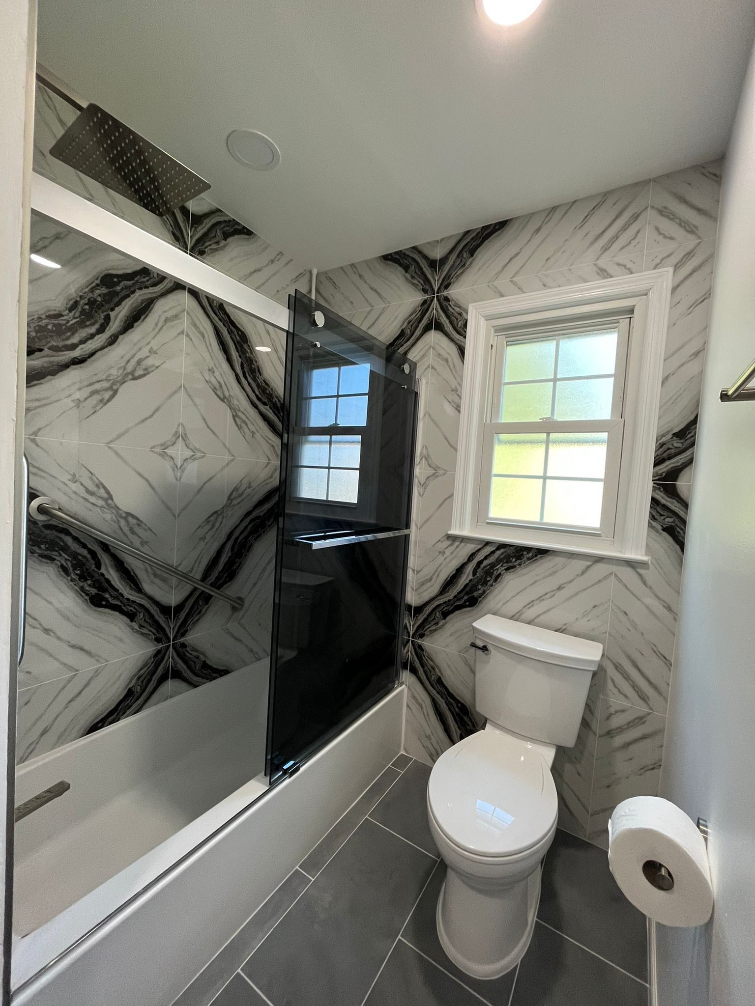 Bathroom Remodel using Tile by Home Concepts Construction